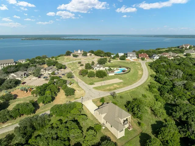 a view of a lake with a building in the background