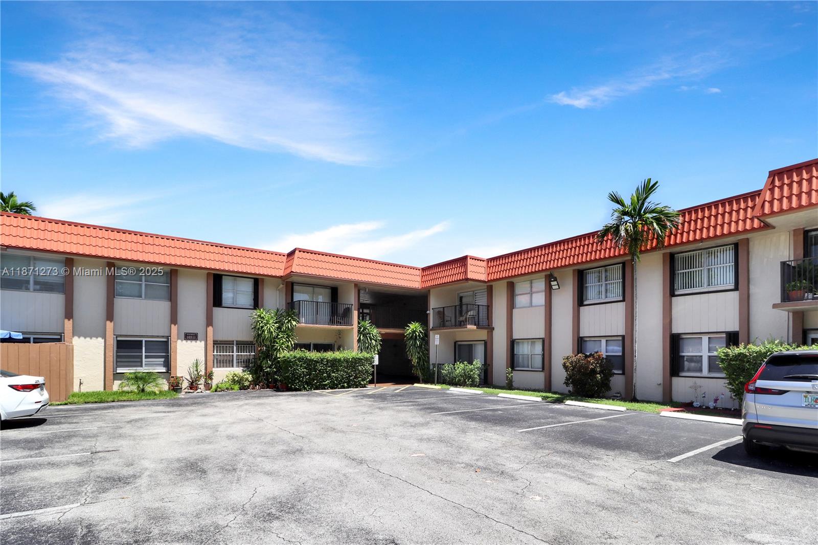 10511 Southwest 108th Avenue, Unit 185 Miami, FL 33176 - Photo 18 of 18 a front view of a house with garden