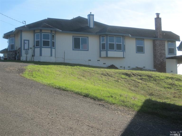 5605 Pressley Road Santa Rosa, CA 95404 - Photo 1 of 1 a view of a house with a yard