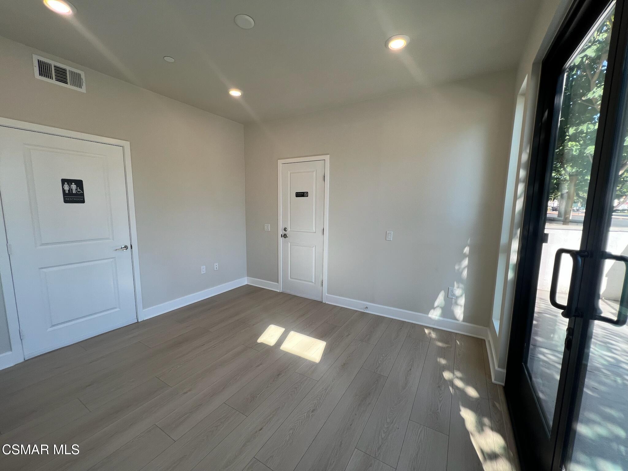 3005 Cochran Street Simi Valley, CA 93065 - Photo 11 of 57 a view of entryway with wooden floor