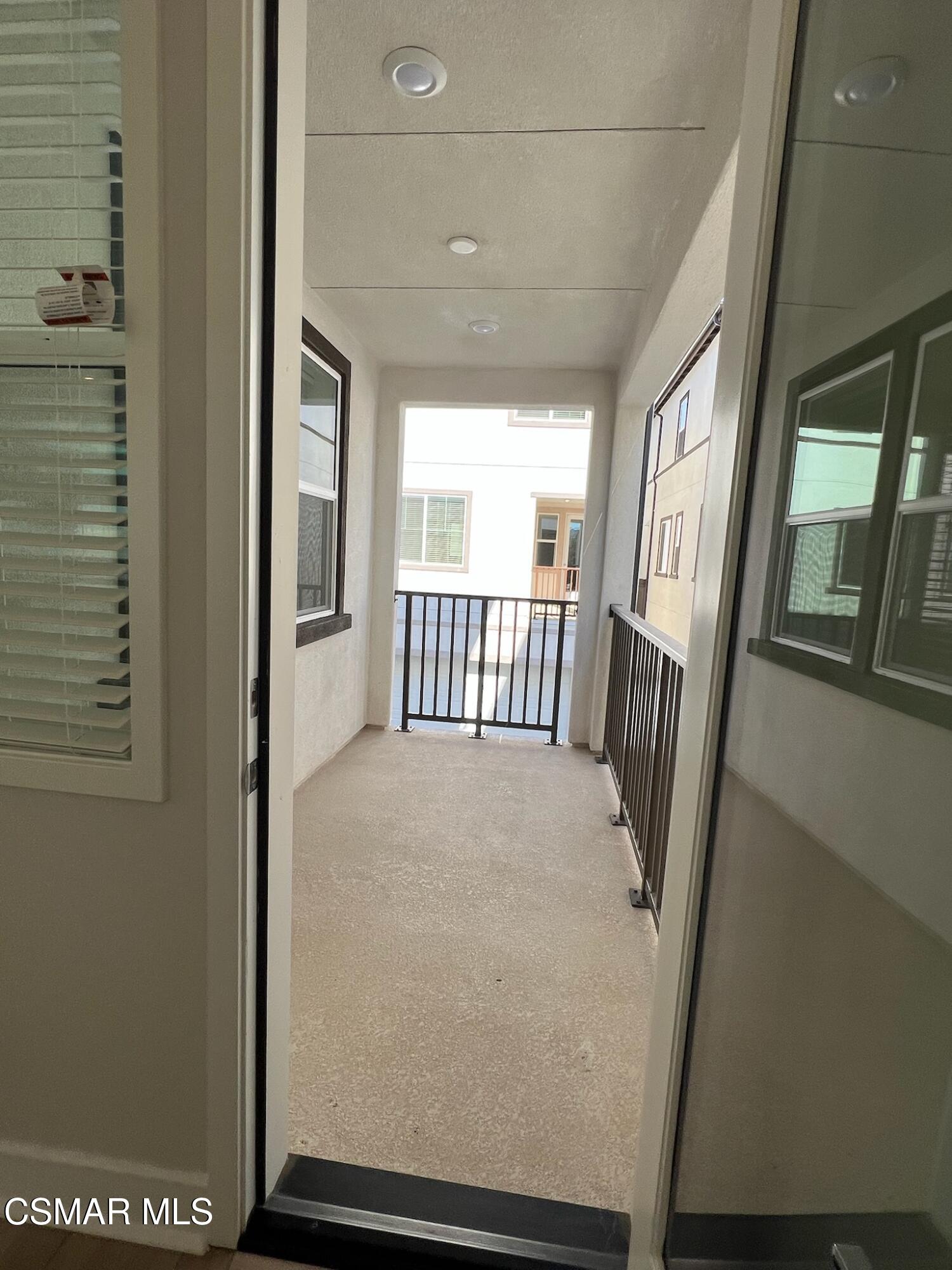 3005 Cochran Street Simi Valley, CA 93065 - Photo 19 of 57 a view of a hallway with a large window
