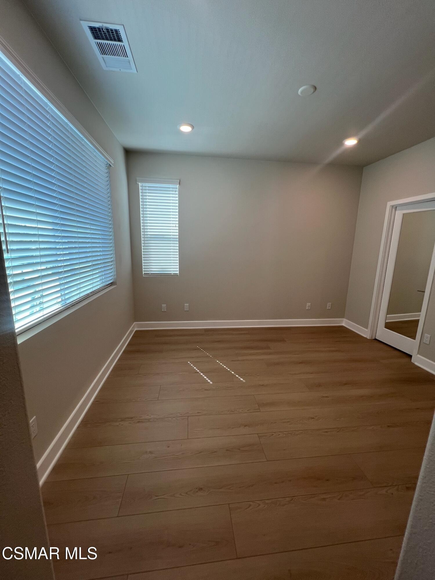 3005 Cochran Street Simi Valley, CA 93065 - Photo 30 of 57 a view of room with window and wooden floor