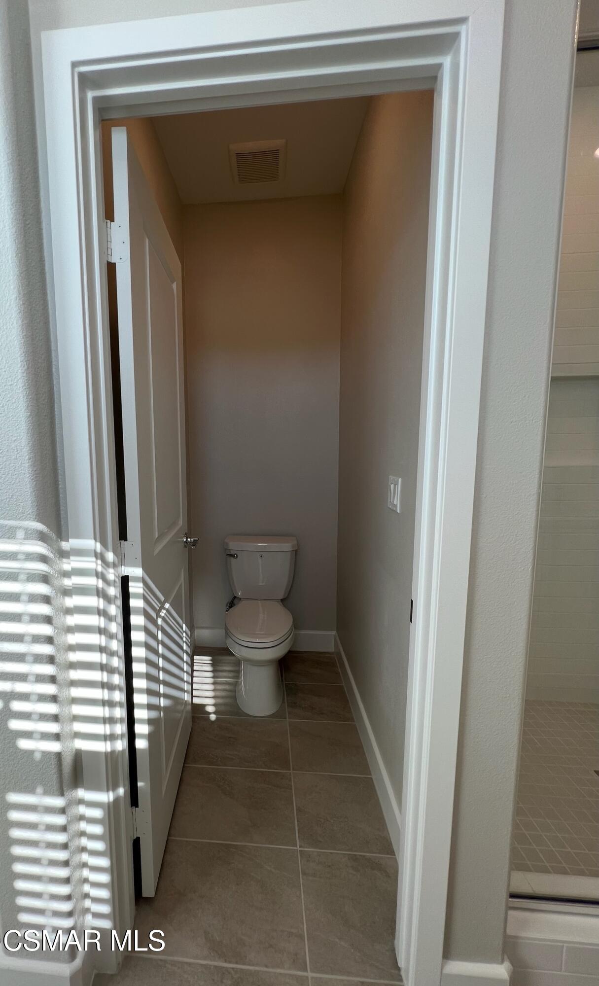 3005 Cochran Street Simi Valley, CA 93065 - Photo 37 of 57 a bathroom with a toilet