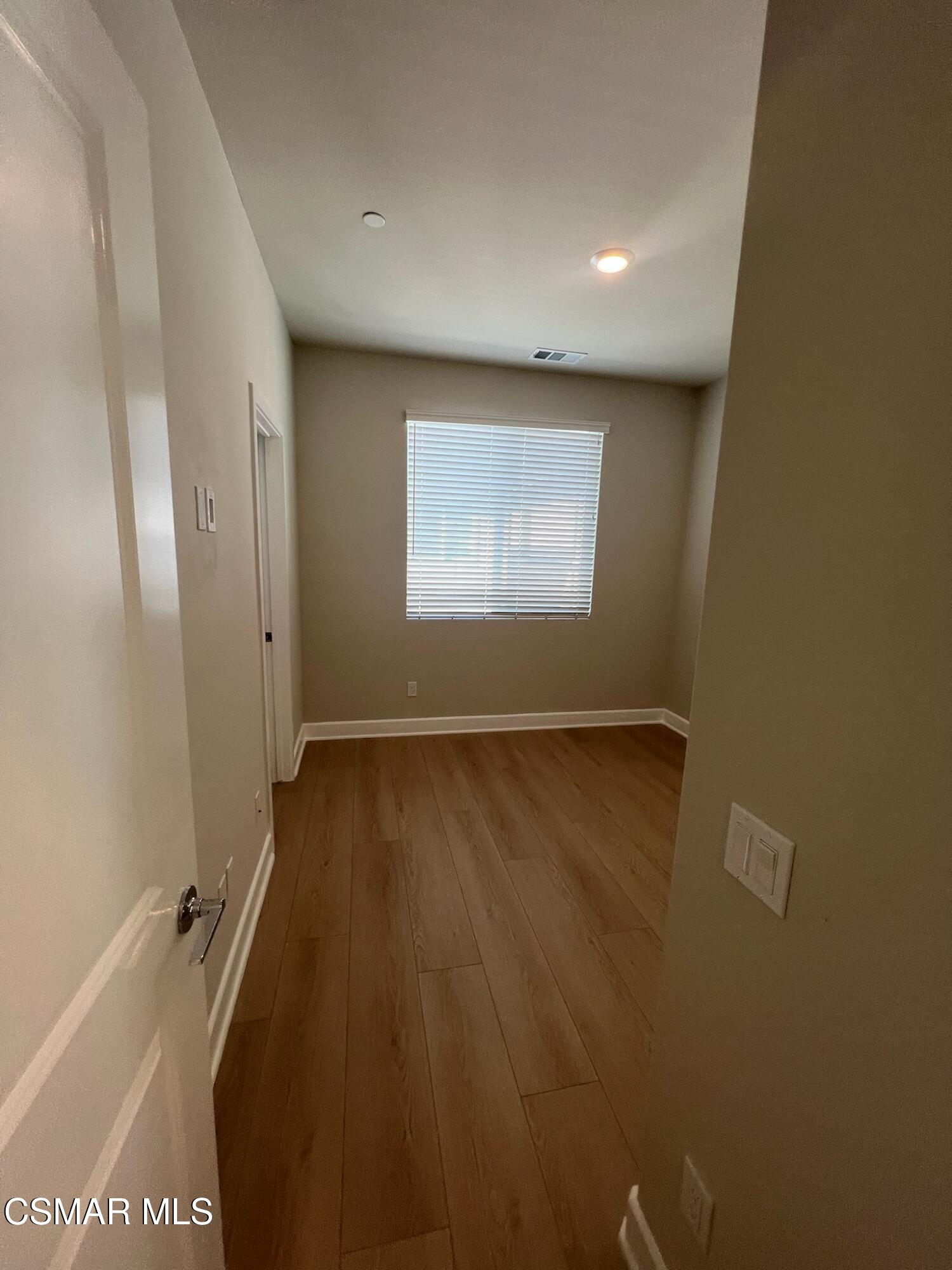 3005 Cochran Street Simi Valley, CA 93065 - Photo 38 of 57 a view of room with window and hardwood floor