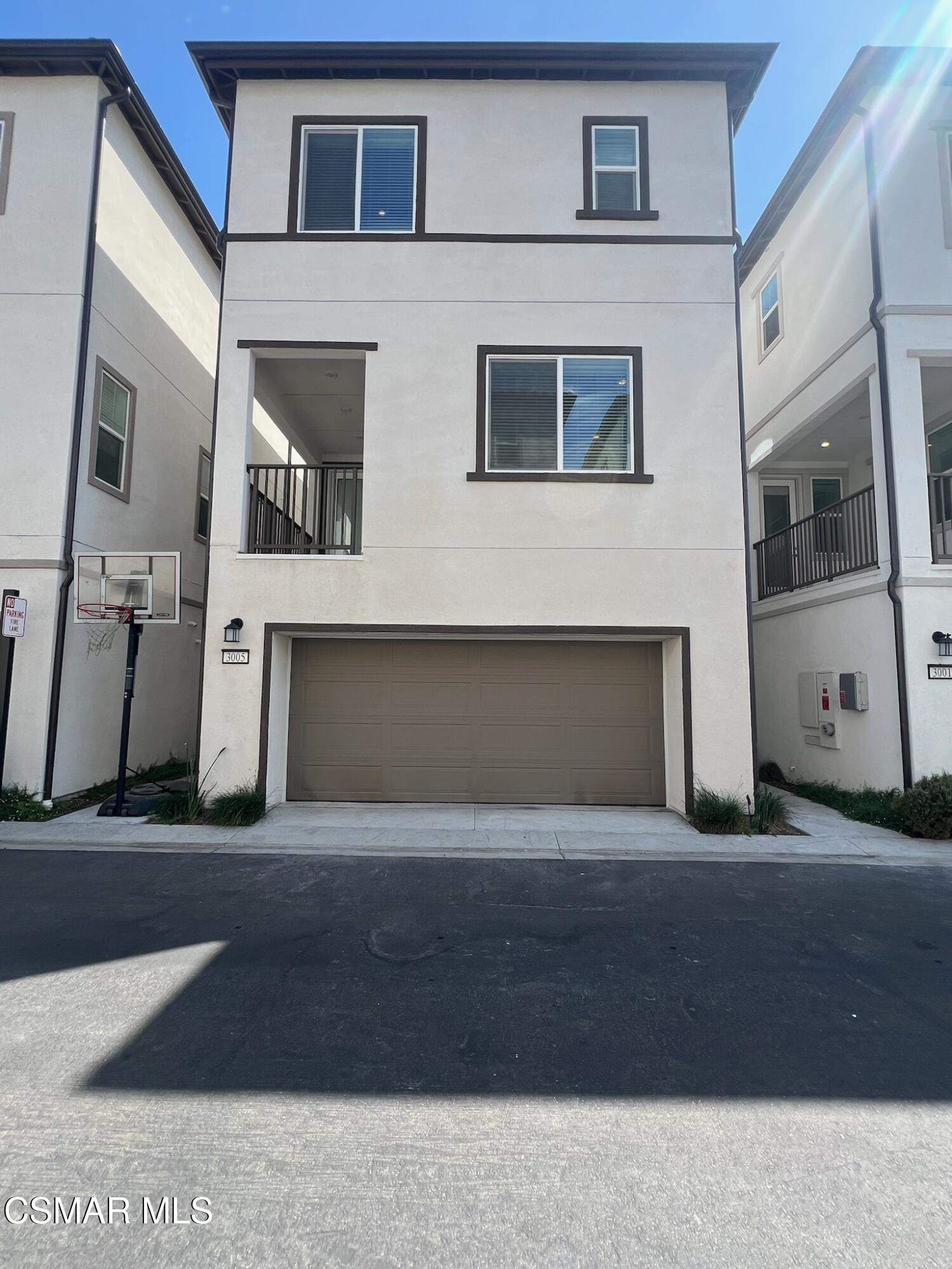 3005 Cochran Street Simi Valley, CA 93065 - Photo 49 of 57 a front view of a house with many windows
