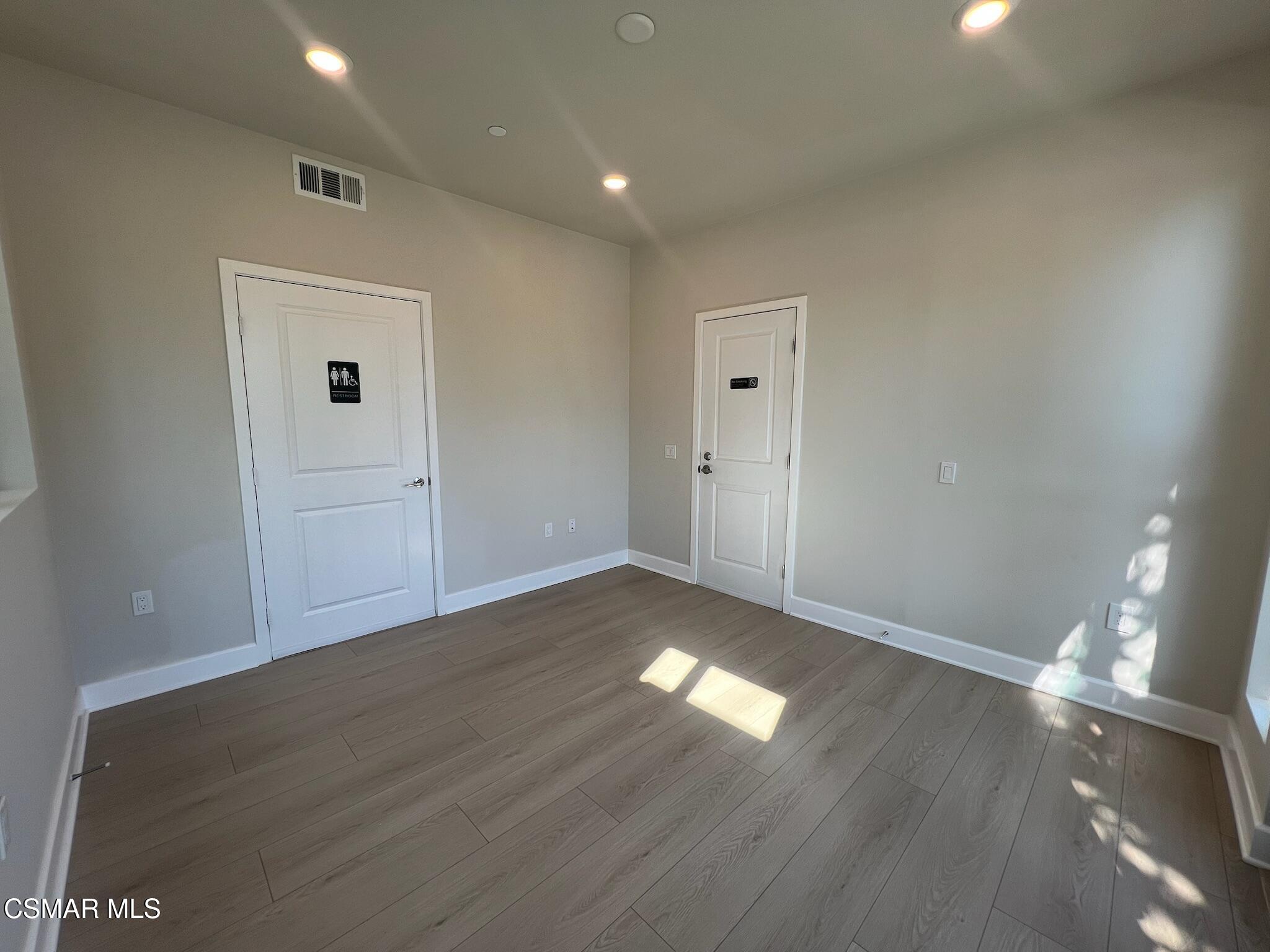 3005 Cochran Street Simi Valley, CA 93065 - Photo 10 of 57 wooden floor in an empty room