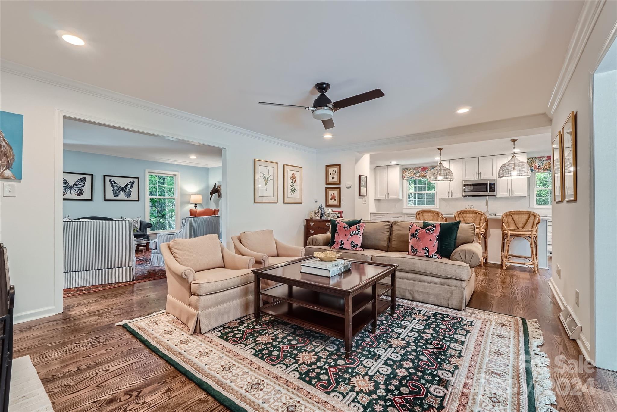 3910 Chevington Road Charlotte, NC 28226 - Photo 16 of 40 a living room with furniture ceiling fan and a rug