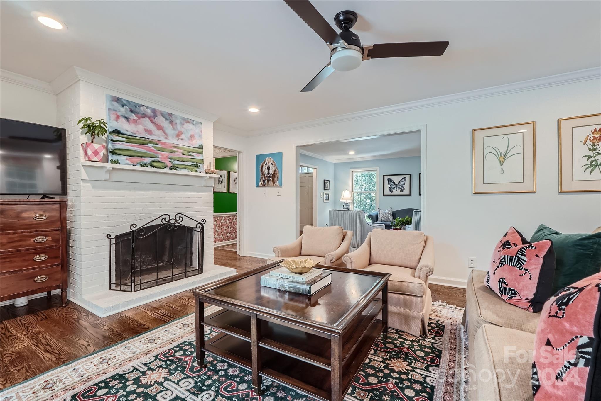3910 Chevington Road Charlotte, NC 28226 - Photo 18 of 40 a living room with furniture and a fireplace