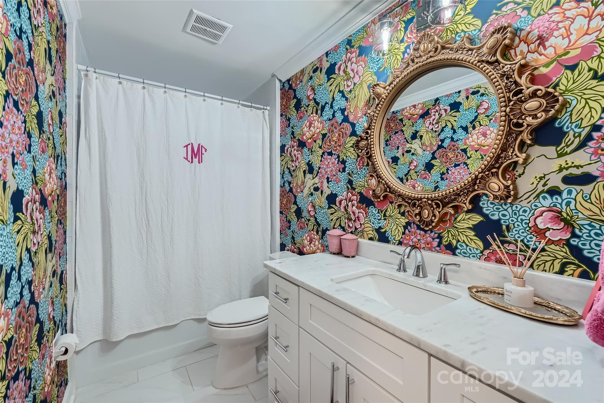 3910 Chevington Road Charlotte, NC 28226 - Photo 22 of 40 a bathroom with a sink and a toilet