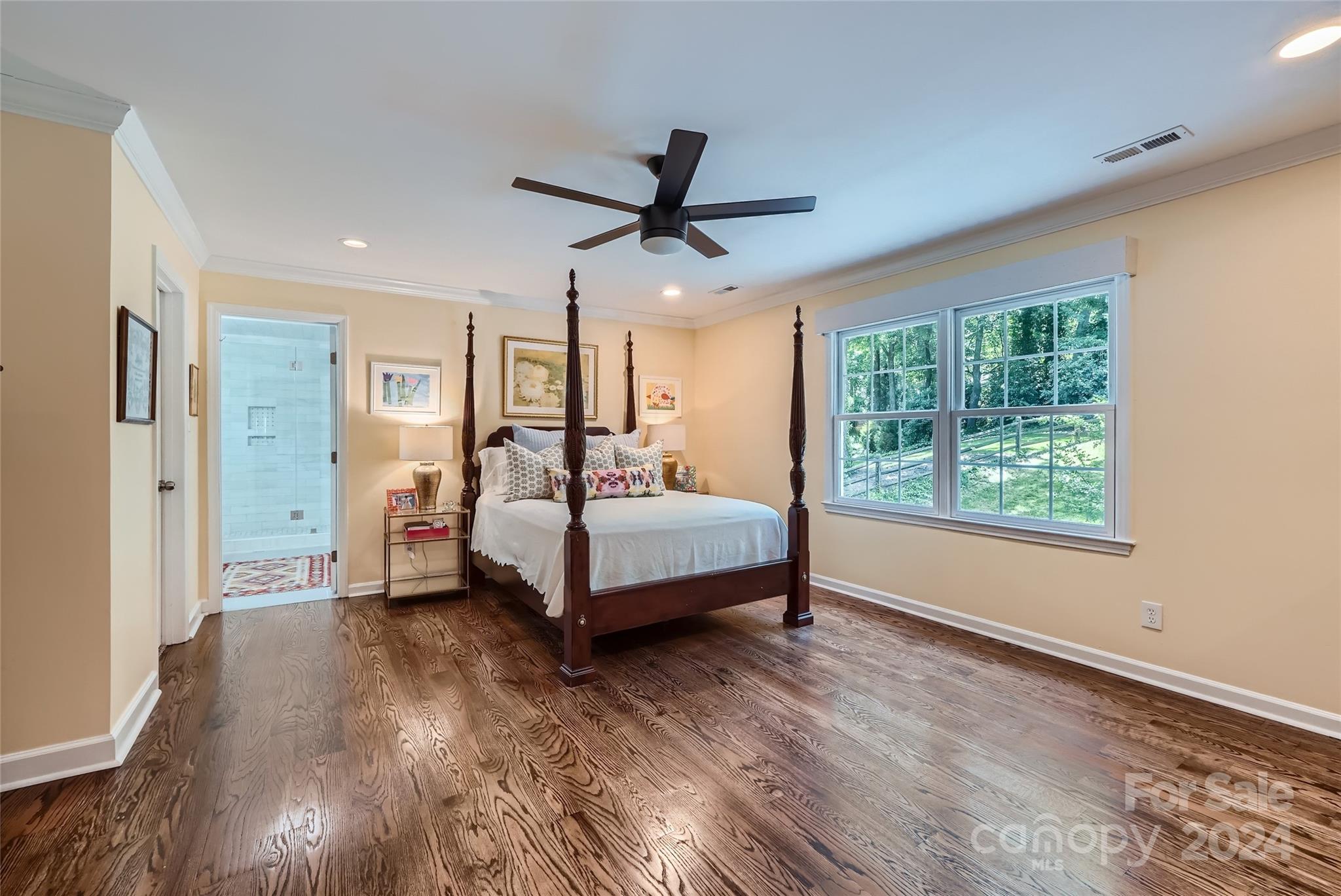 3910 Chevington Road Charlotte, NC 28226 - Photo 28 of 40 a bedroom with a bed and a window