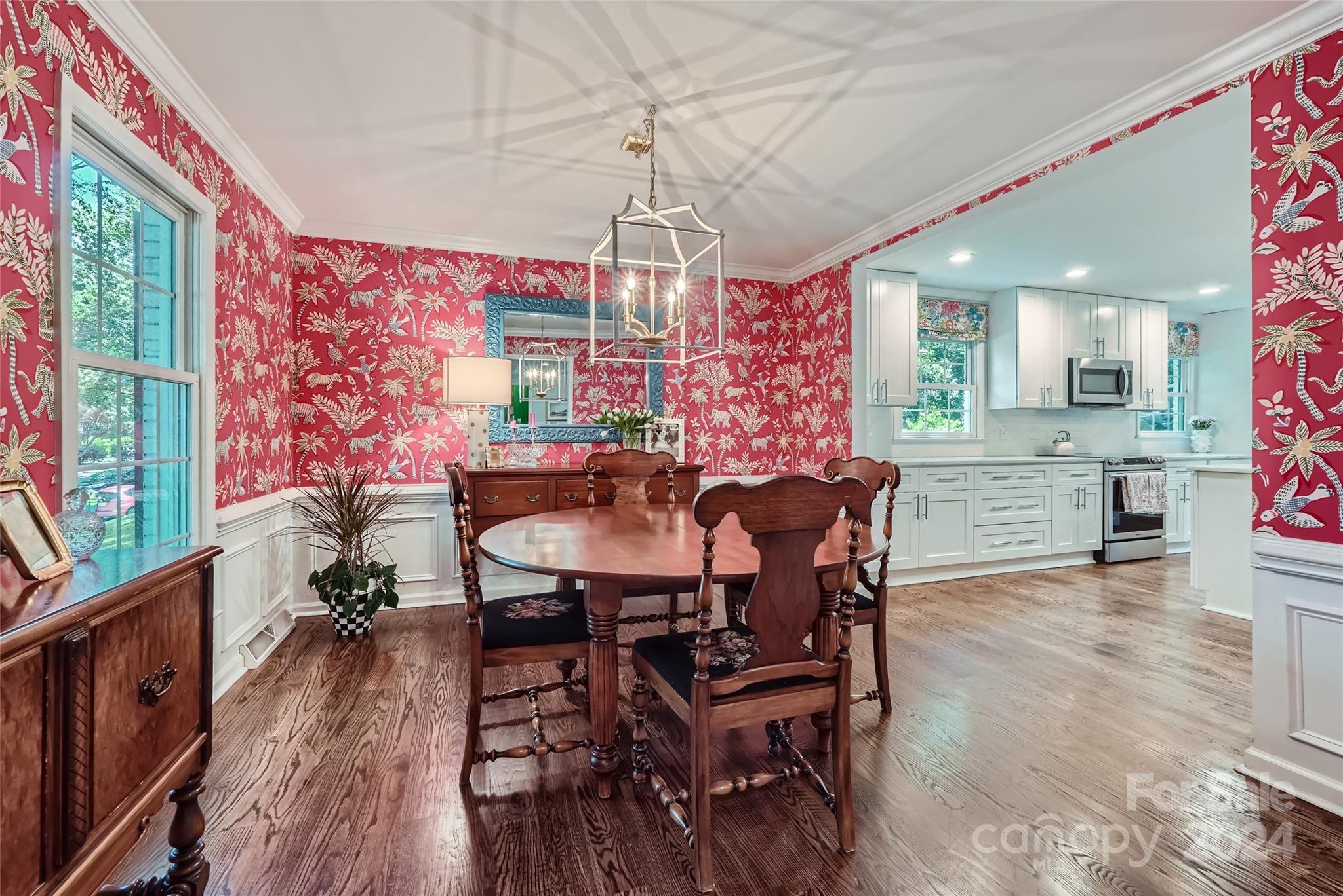 3910 Chevington Road Charlotte, NC 28226 - Photo 8 of 40 a view of a dining room with furniture window and wooden floor