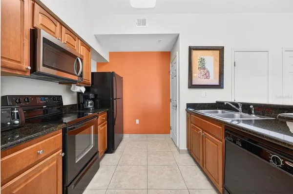 $180,000 | 8125 Resort Village Drive, Unit 5901, Orlando, FL 32821