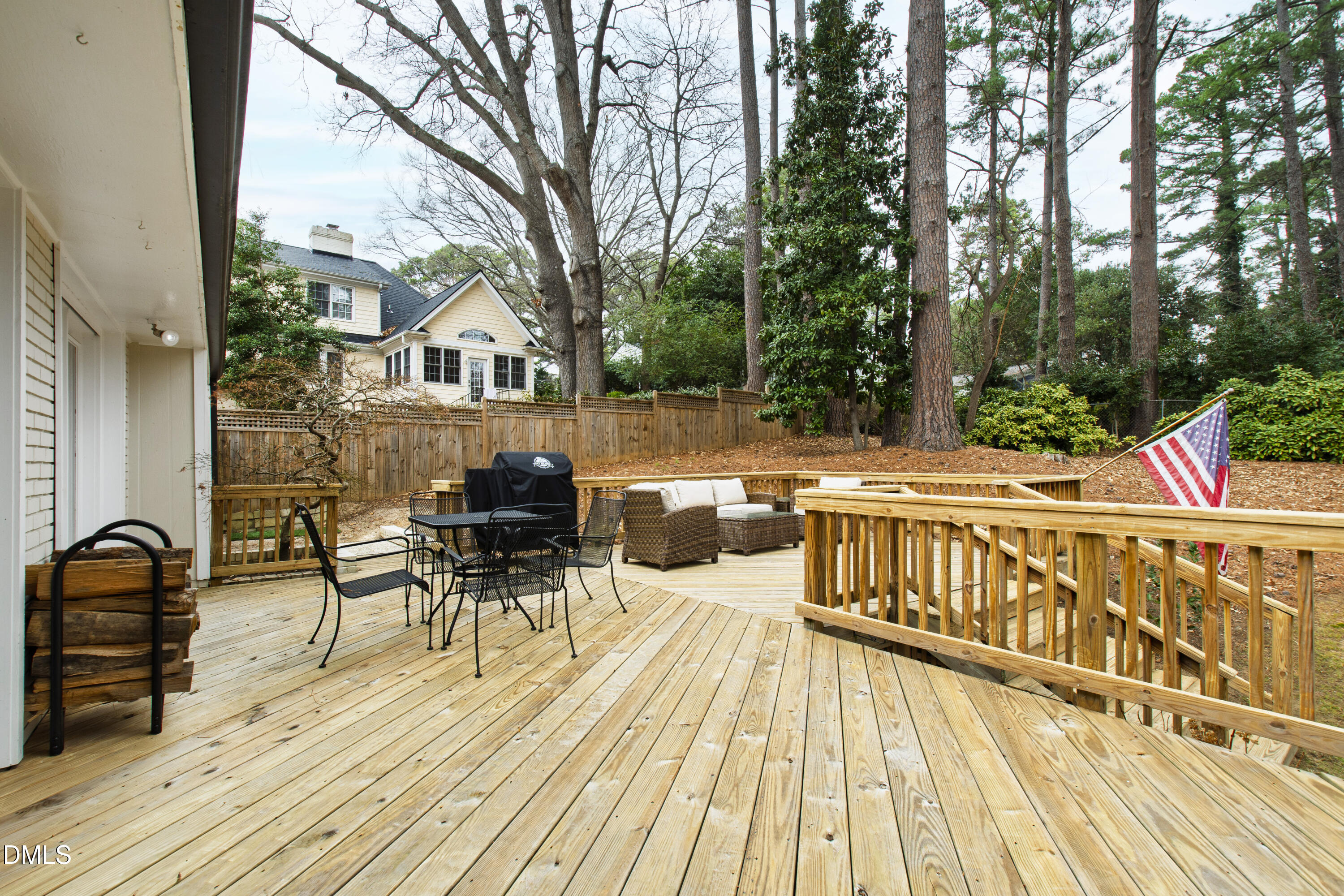 908 Brookwood Drive Raleigh, NC 27607 - Photo 21 of 27 a view of a chair and tables on the roof deck