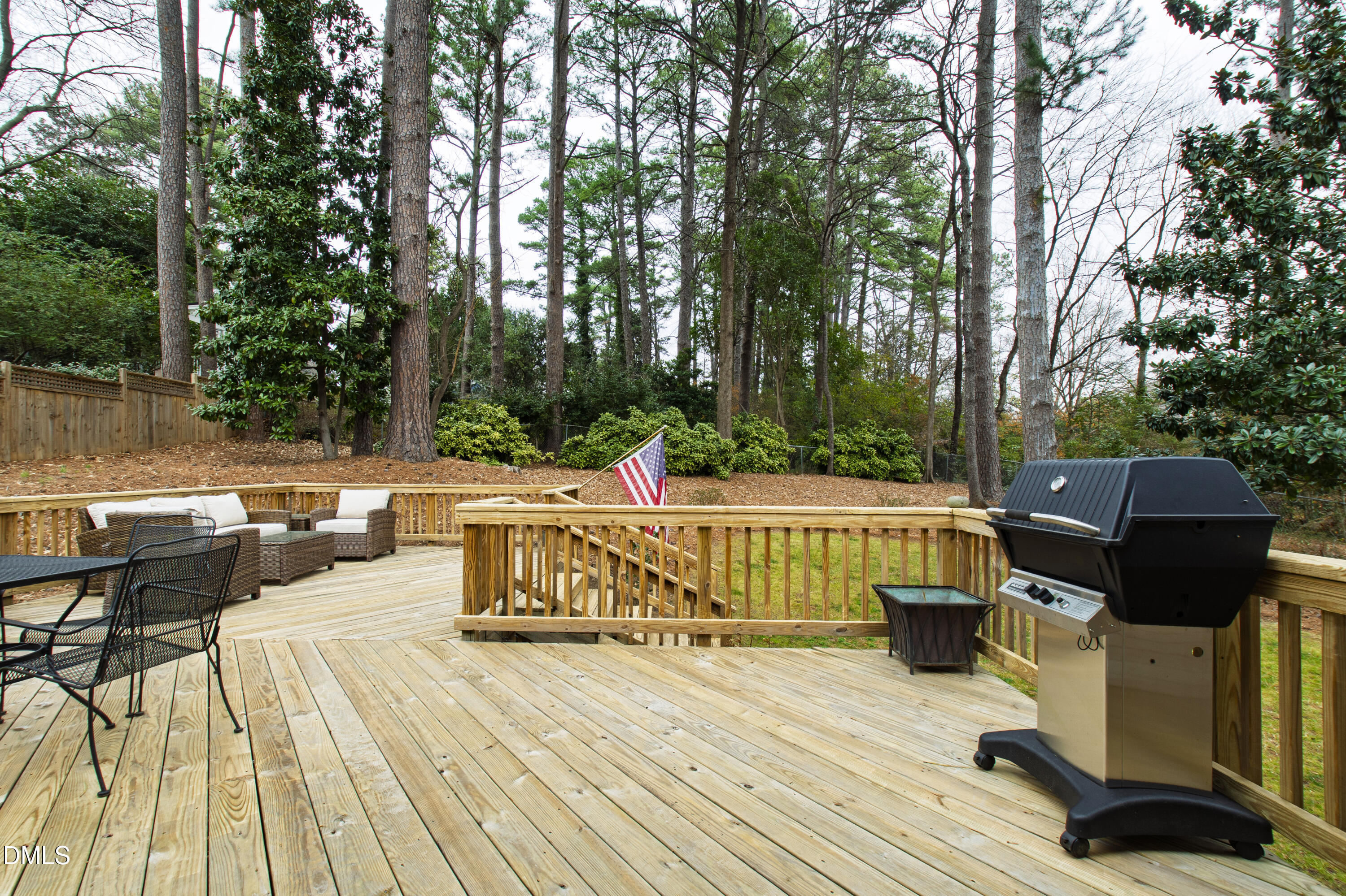 908 Brookwood Drive Raleigh, NC 27607 - Photo 22 of 27 a view of backyard with sitting area