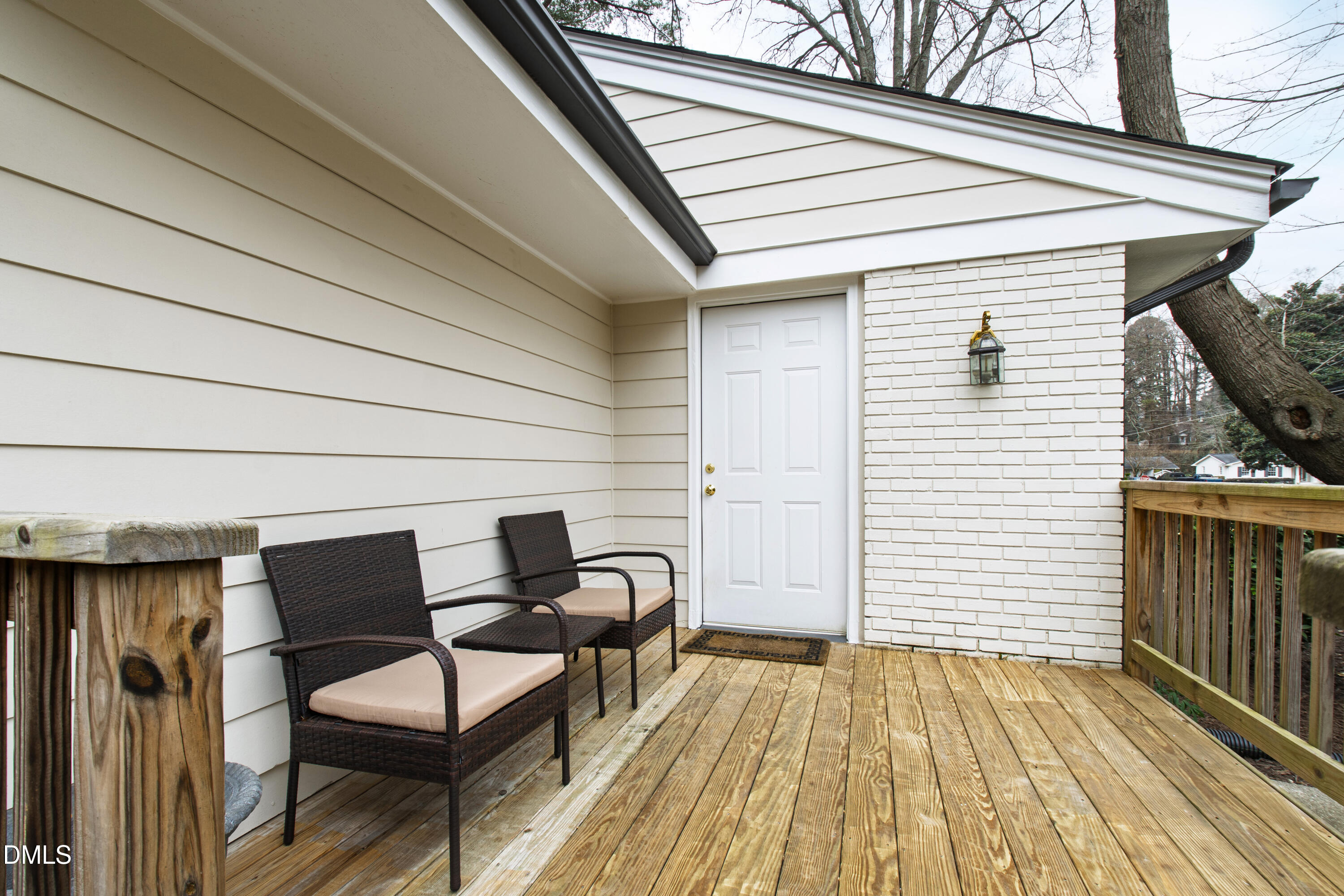 908 Brookwood Drive Raleigh, NC 27607 - Photo 27 of 27 a couple of chairs sitting in balcony with wooden floor