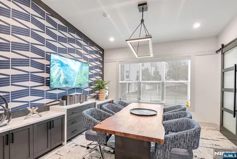 a room with furniture and a window