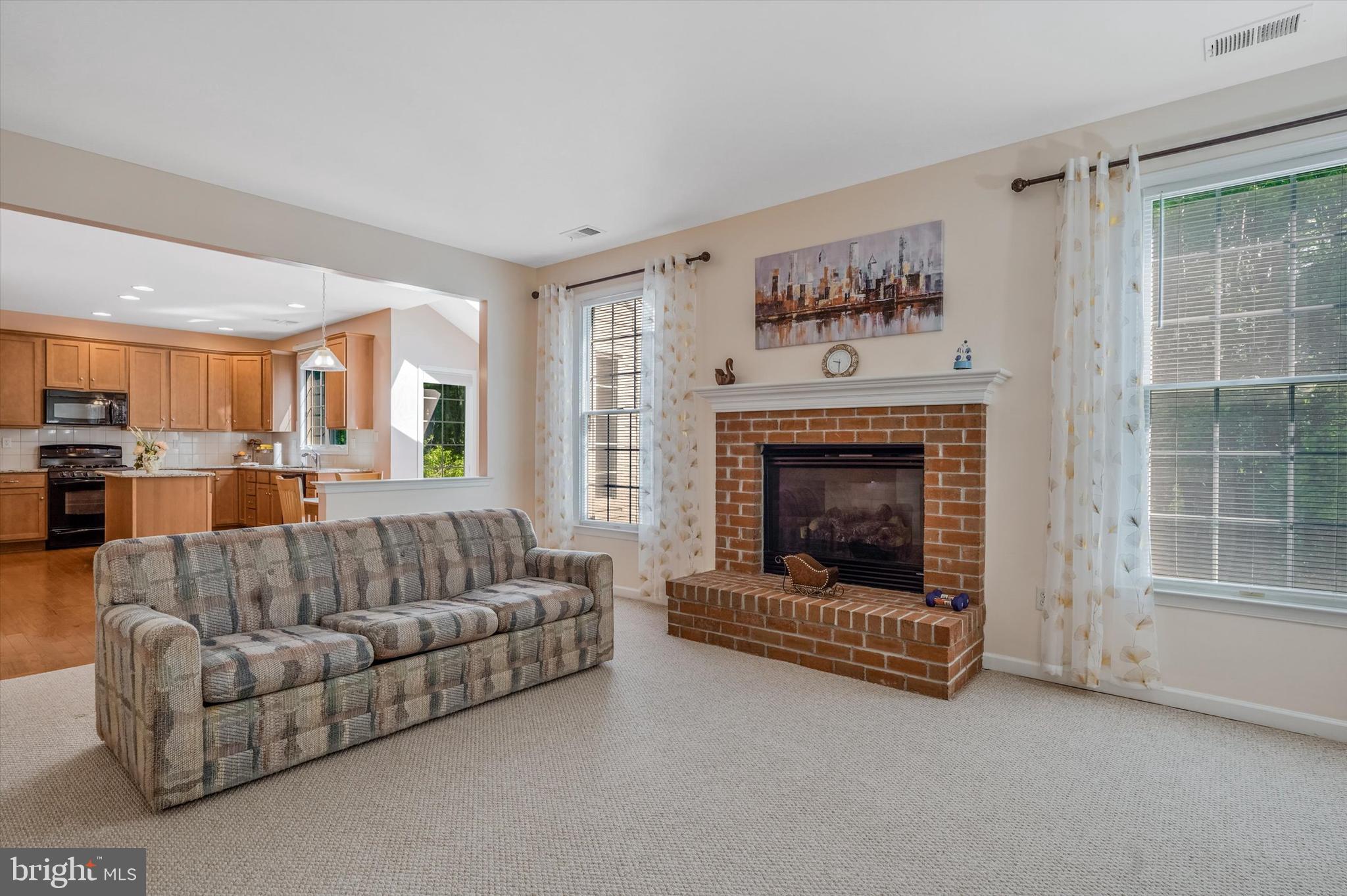 14 Devonshire Drive Princeton, NJ 08540 - Photo 17 of 36 a living room with furniture and a fireplace
