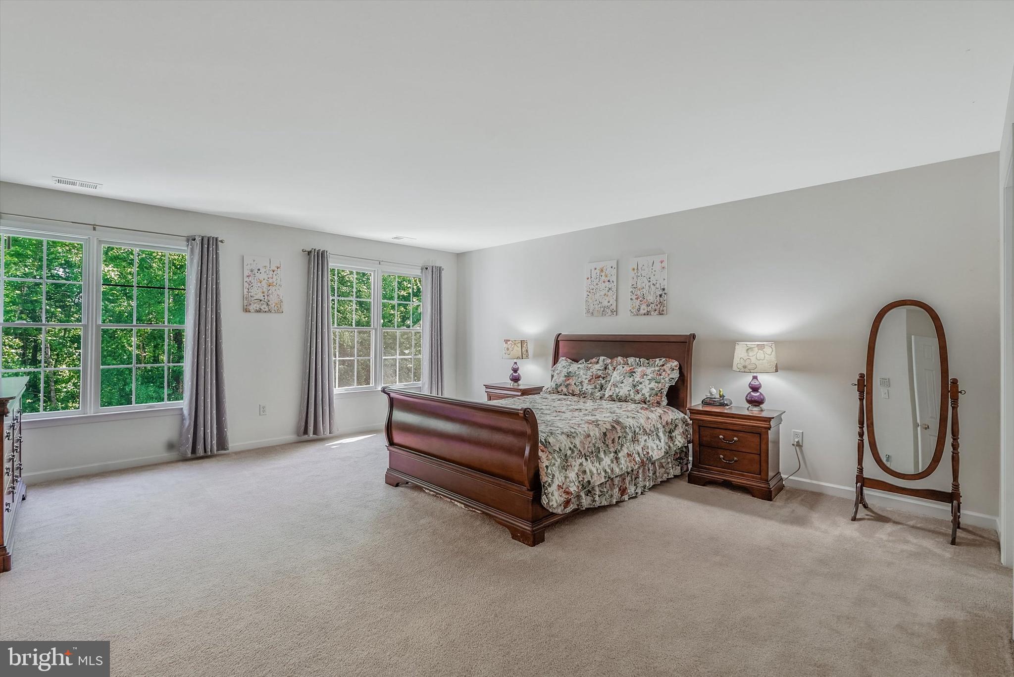 14 Devonshire Drive Princeton, NJ 08540 - Photo 18 of 36 a spacious bedroom with a bed and a large window