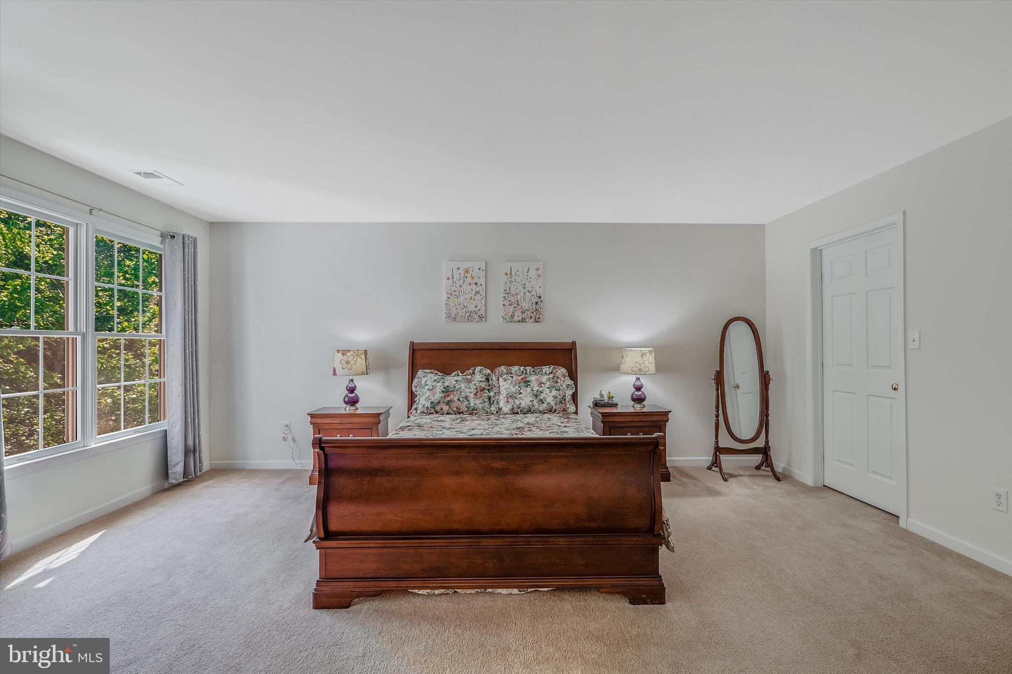 14 Devonshire Drive Princeton, NJ 08540 - Photo 19 of 36 a bedroom with a bed and a large window