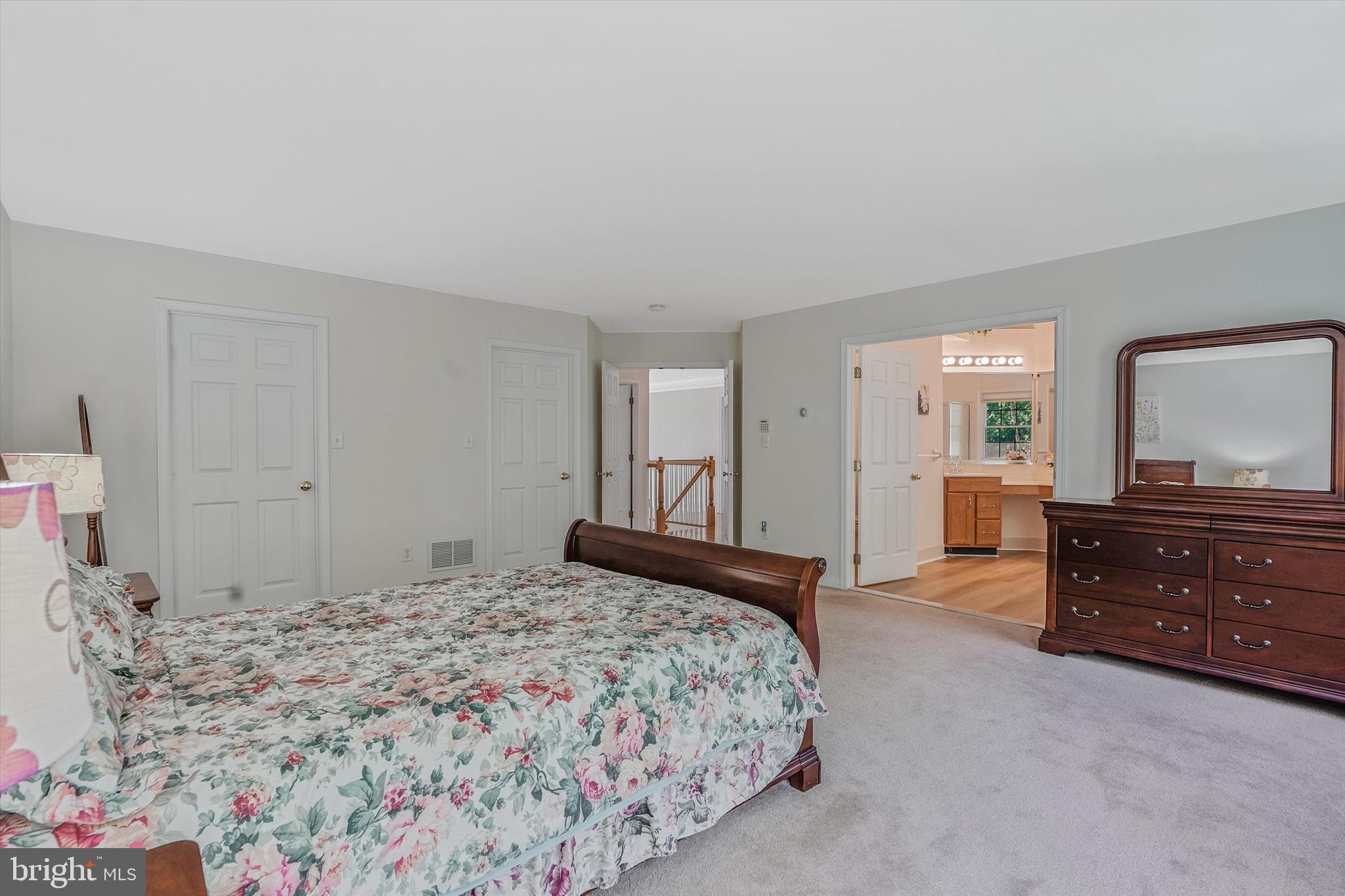 14 Devonshire Drive Princeton, NJ 08540 - Photo 20 of 36 a bedroom with a bed and a dresser in it