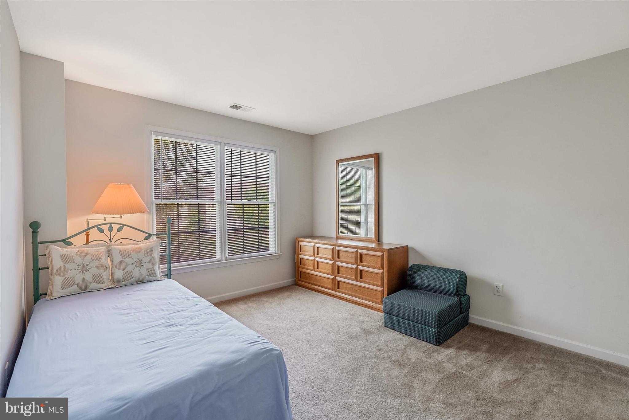 14 Devonshire Drive Princeton, NJ 08540 - Photo 23 of 36 a bedroom with a bed and a window
