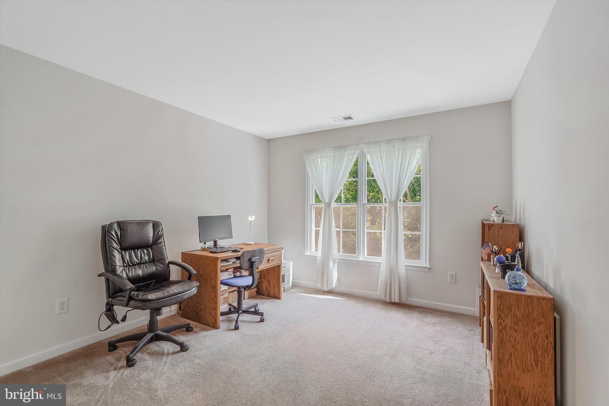 14 Devonshire Drive Princeton, NJ 08540 - Photo 24 of 36 a view of a workspace with furniture and a window
