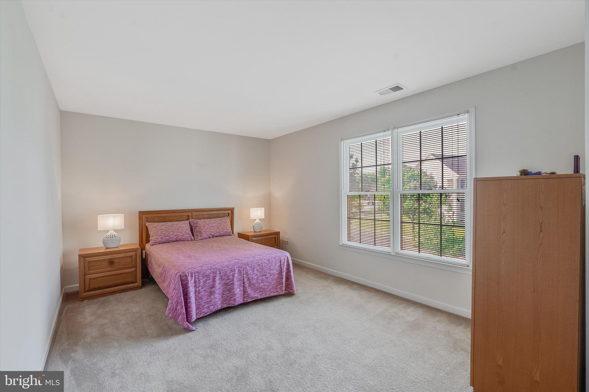 14 Devonshire Drive Princeton, NJ 08540 - Photo 26 of 36 a bedroom with a bed and a window