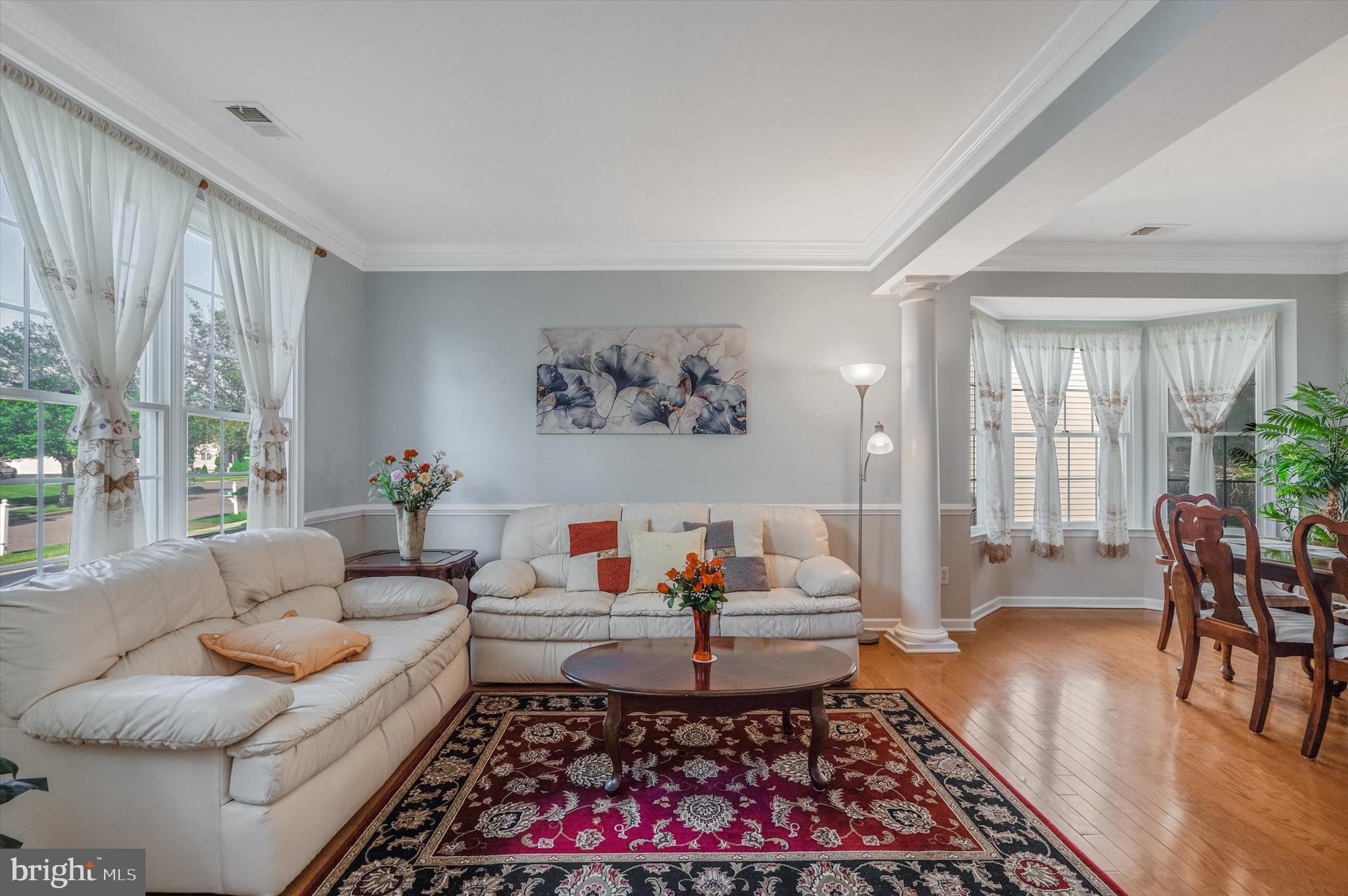 14 Devonshire Drive Princeton, NJ 08540 - Photo 7 of 36 a living room with furniture and a large window