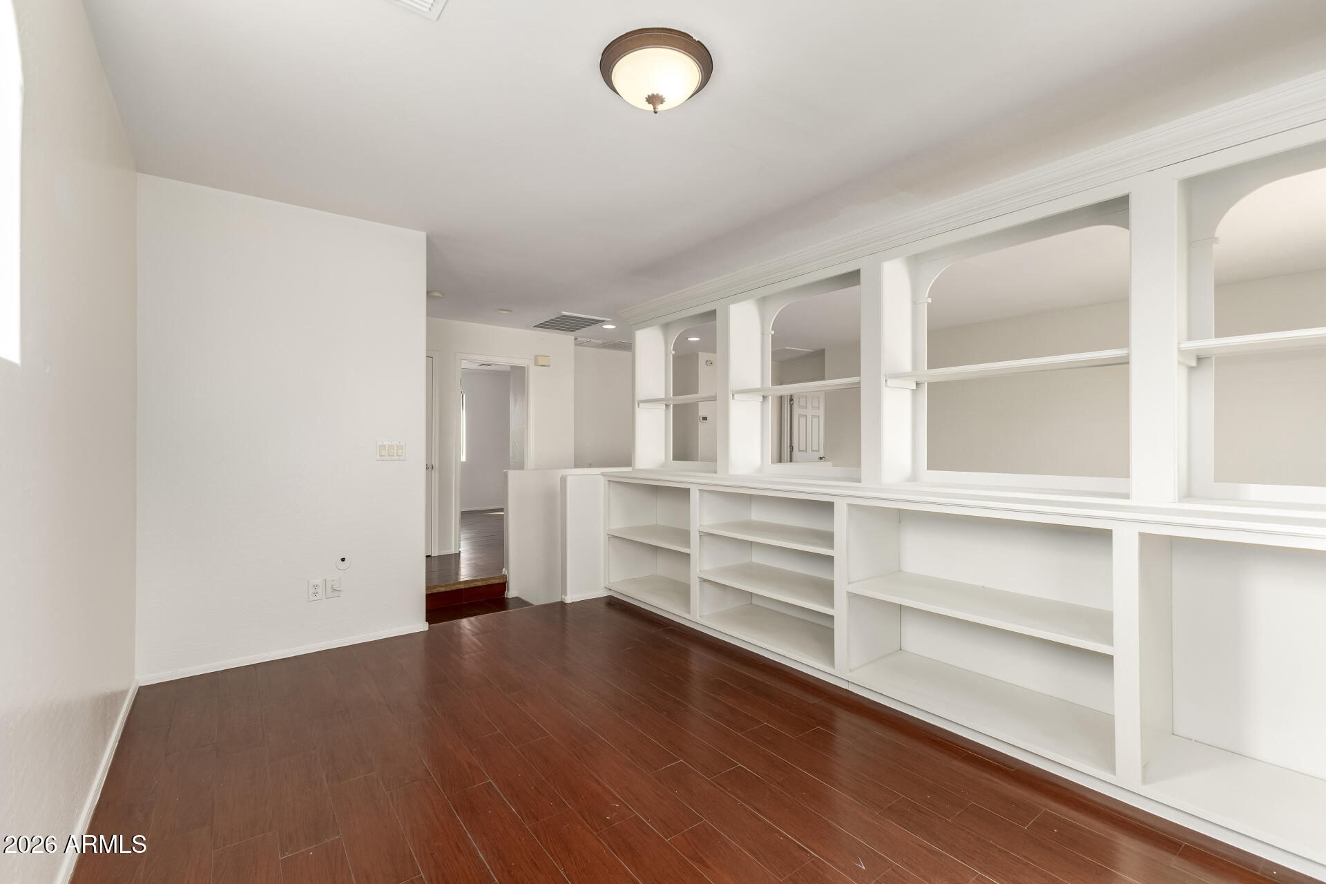 3628 East Janelle Way Gilbert, AZ 85298 - Photo 16 of 38 a view of walk in closet with empty racks