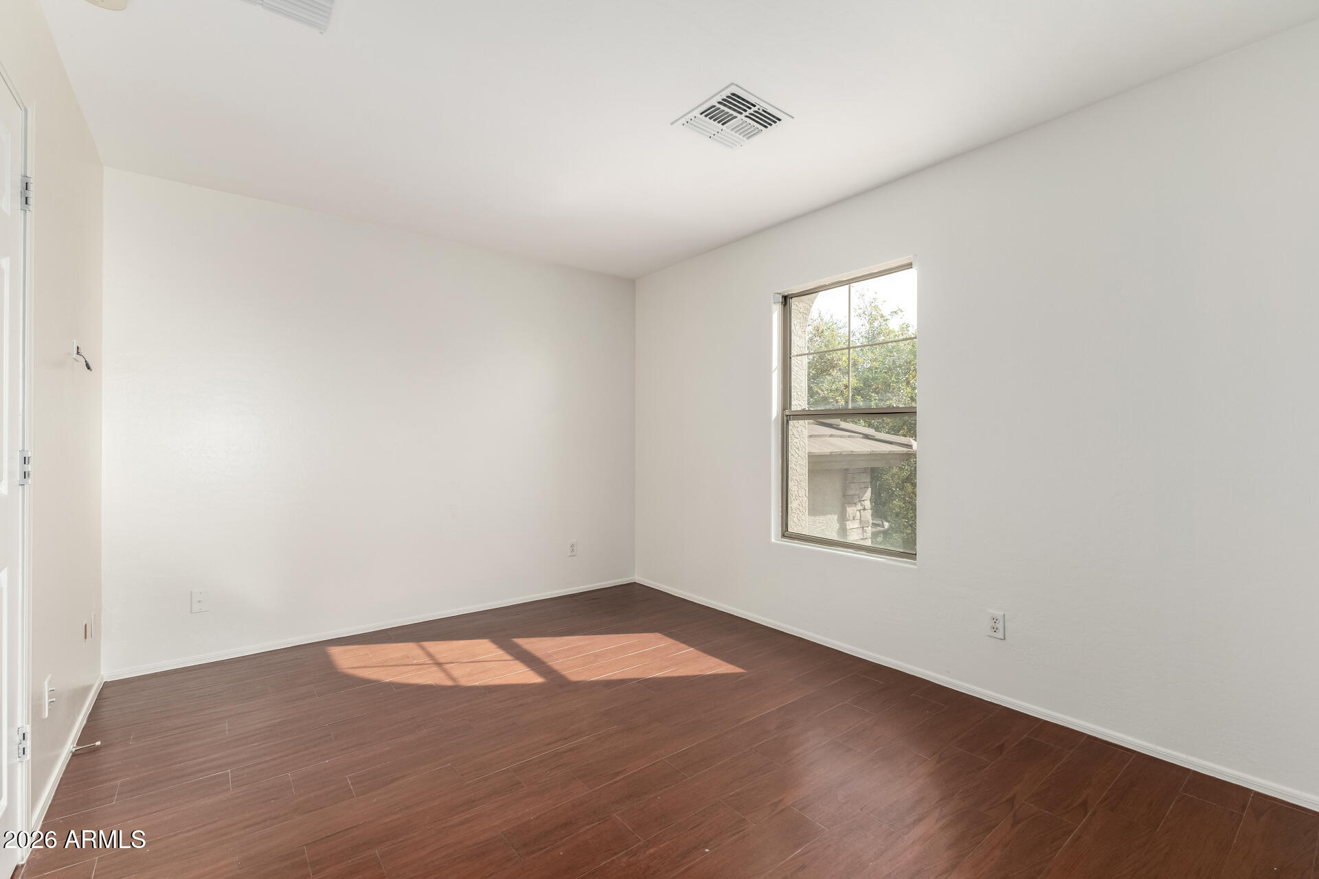 3628 East Janelle Way Gilbert, AZ 85298 - Photo 22 of 38 an empty room with a window