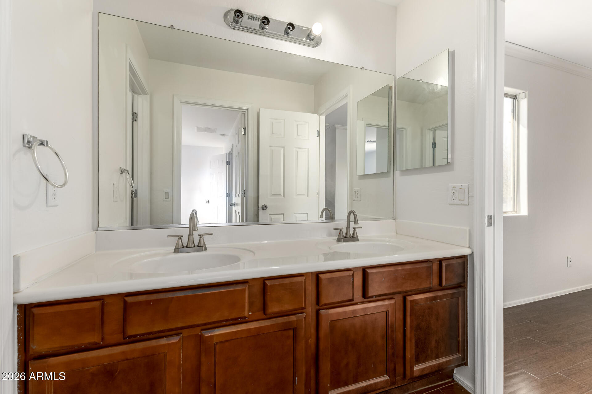 3628 East Janelle Way Gilbert, AZ 85298 - Photo 26 of 38 a bathroom with a sink and a mirror