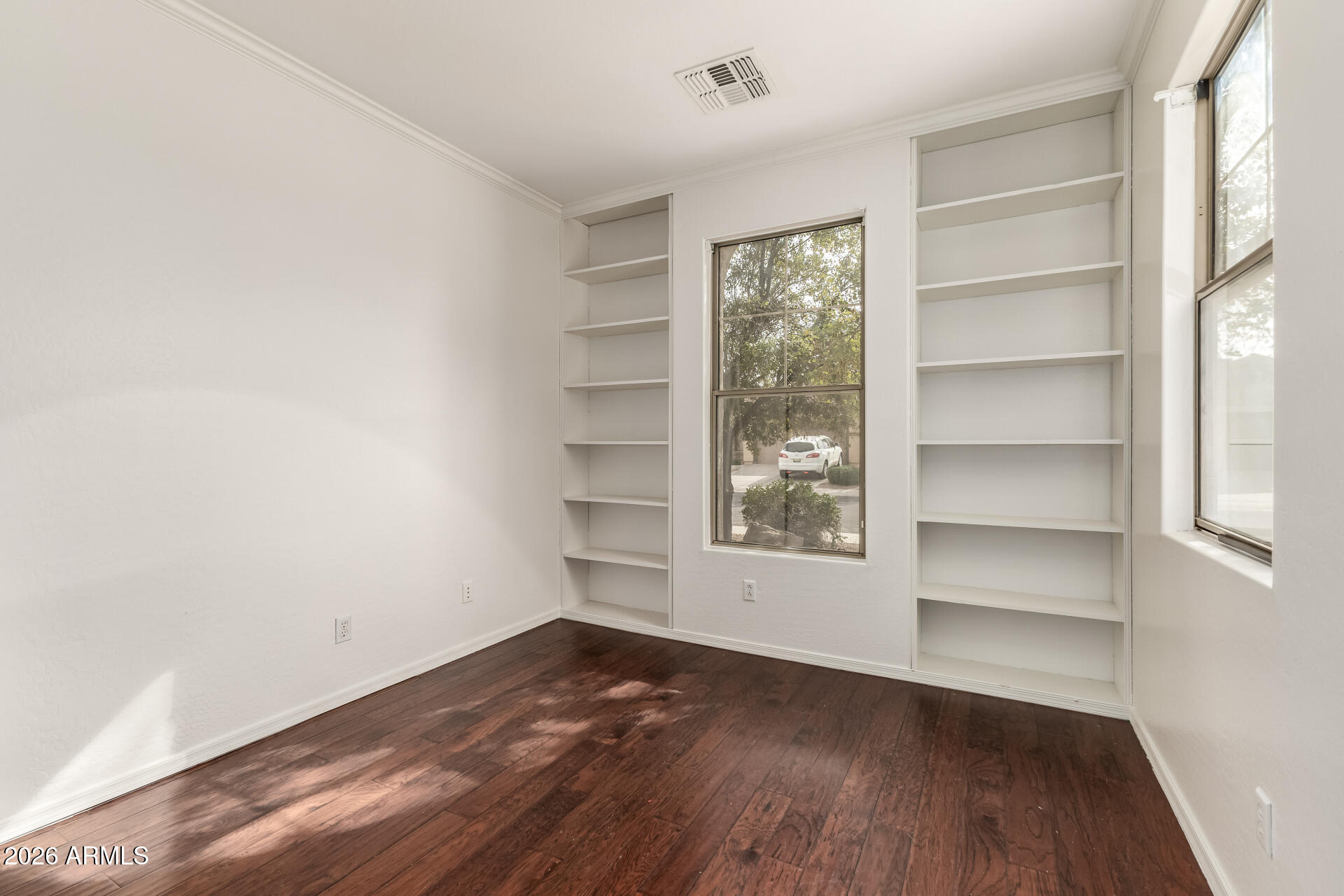 3628 East Janelle Way Gilbert, AZ 85298 - Photo 28 of 38 a view of a room with wooden floor and windows