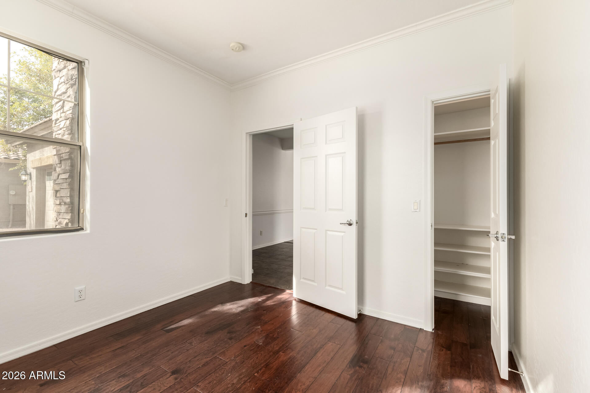 3628 East Janelle Way Gilbert, AZ 85298 - Photo 29 of 38 a view of empty room with wooden floor and window