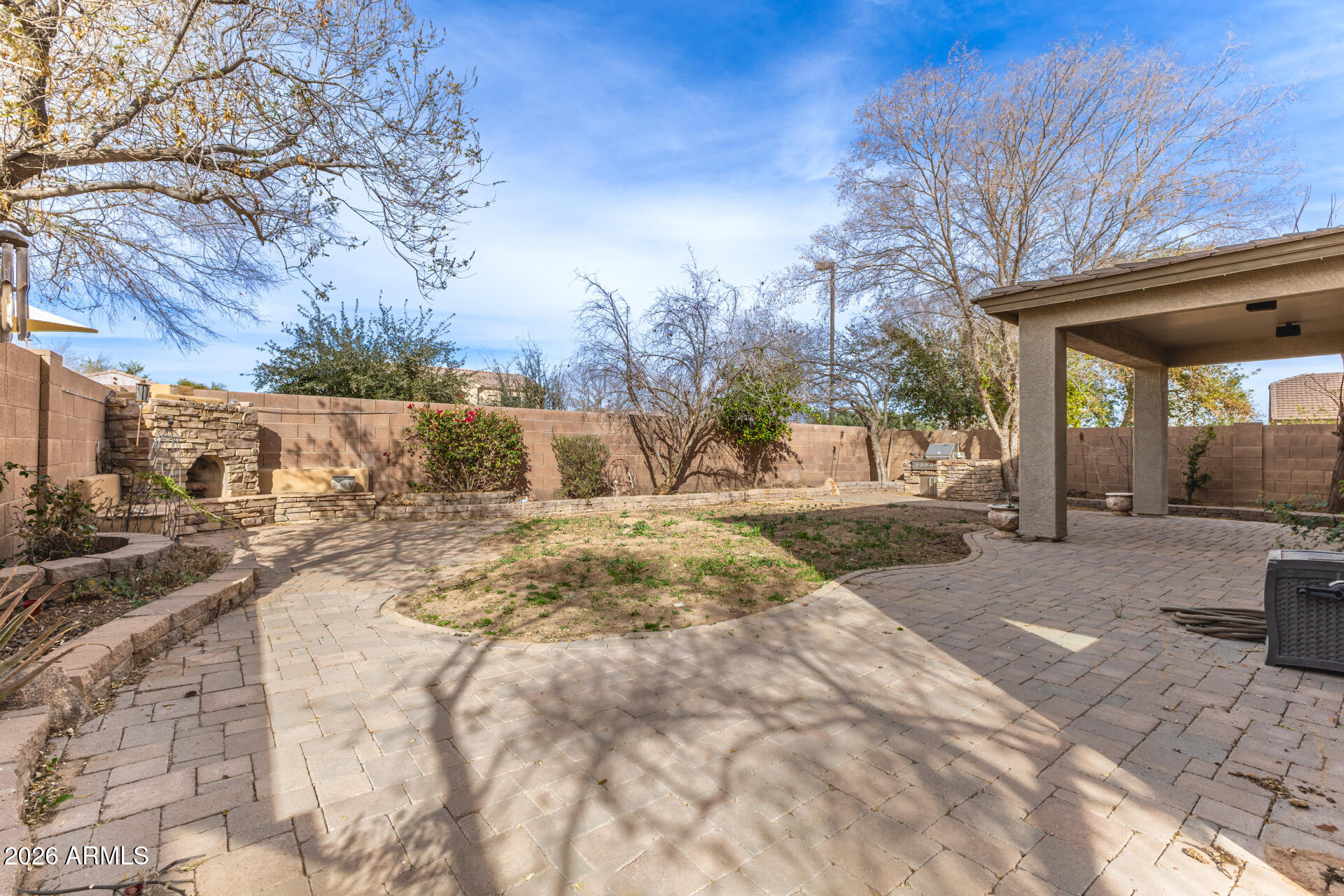 3628 East Janelle Way Gilbert, AZ 85298 - Photo 37 of 38 a view of a yard with cars