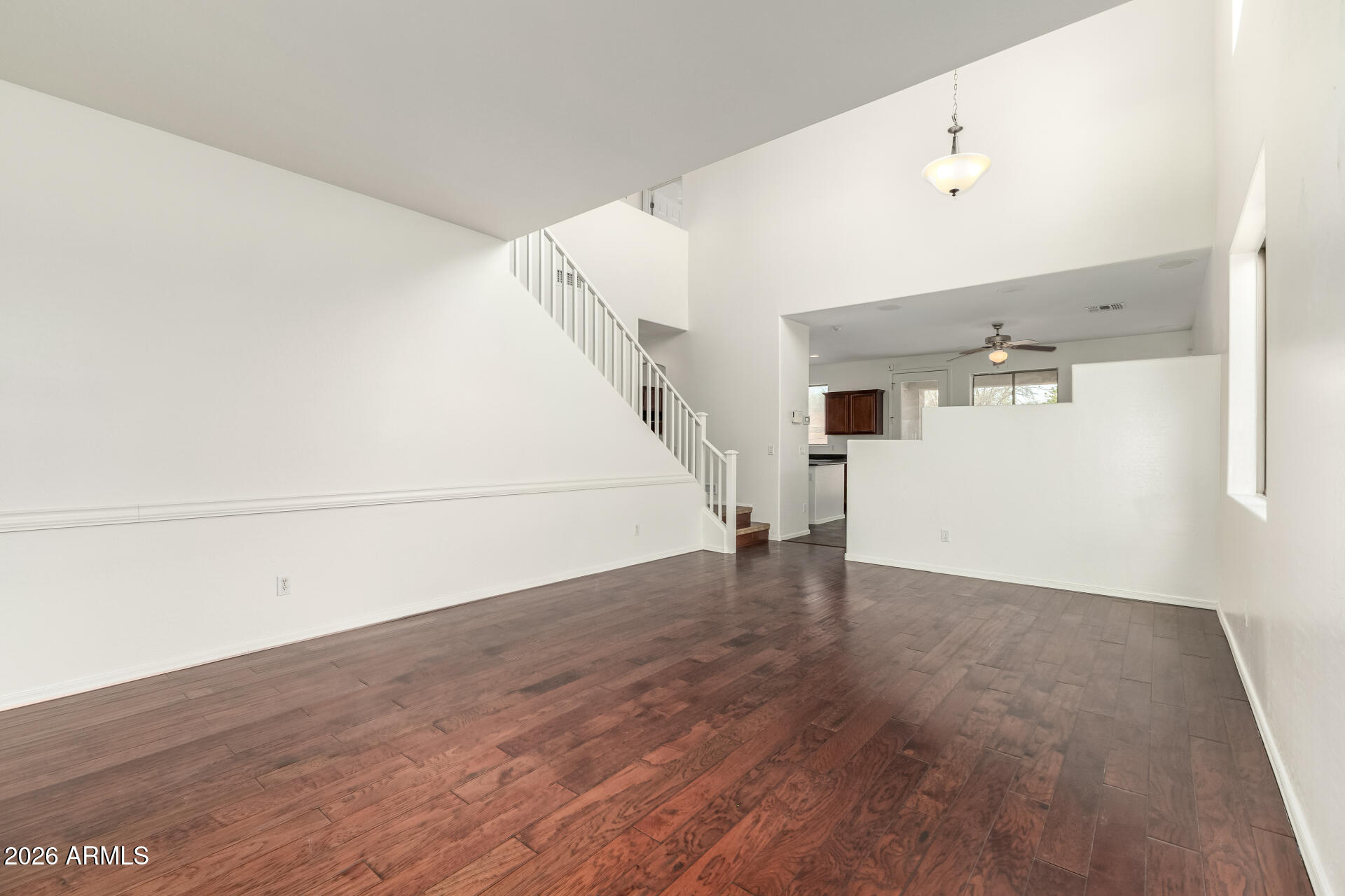 3628 East Janelle Way Gilbert, AZ 85298 - Photo 5 of 38 a view of a livingroom with wooden floor
