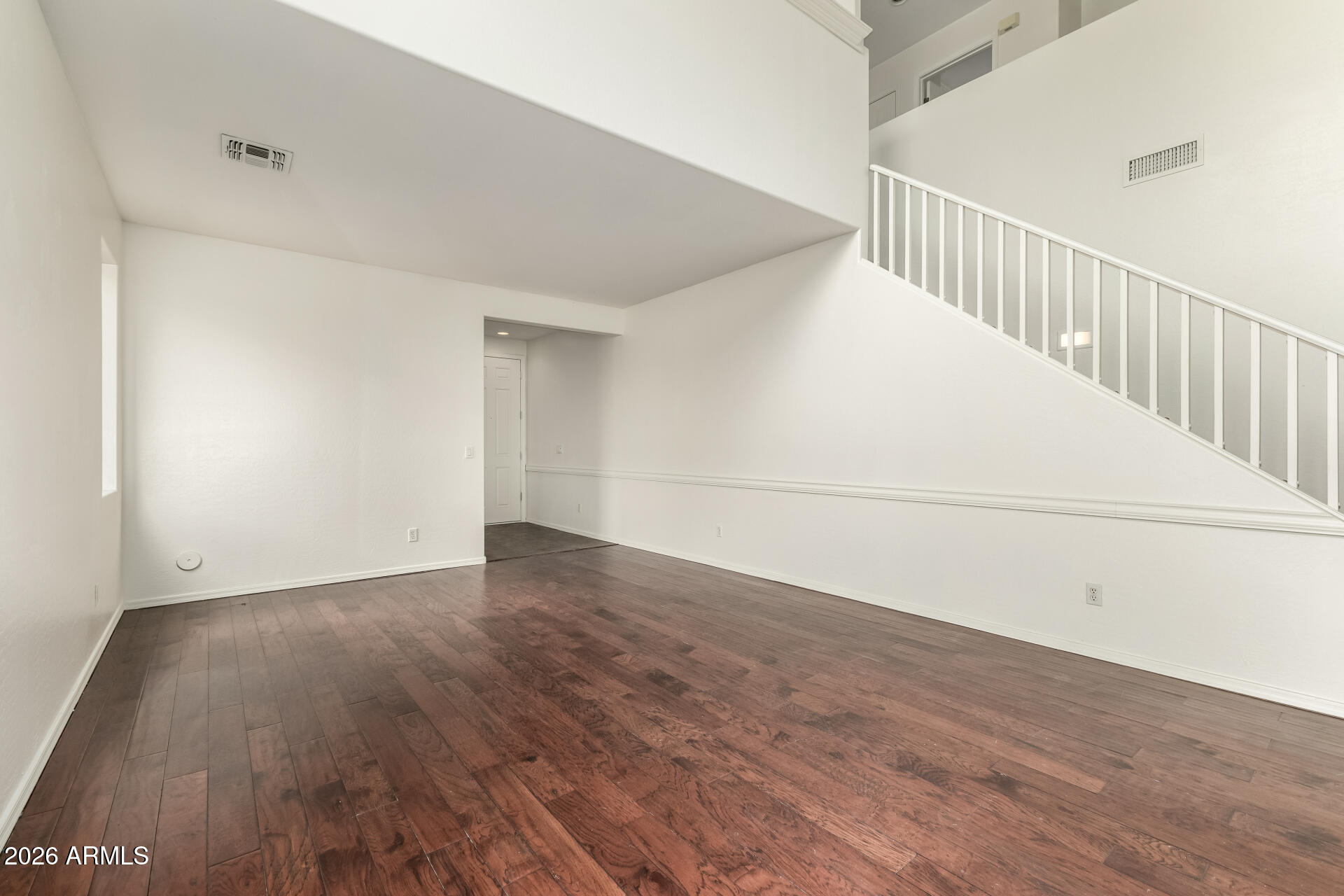 3628 East Janelle Way Gilbert, AZ 85298 - Photo 6 of 38 a view of a room with wooden floor