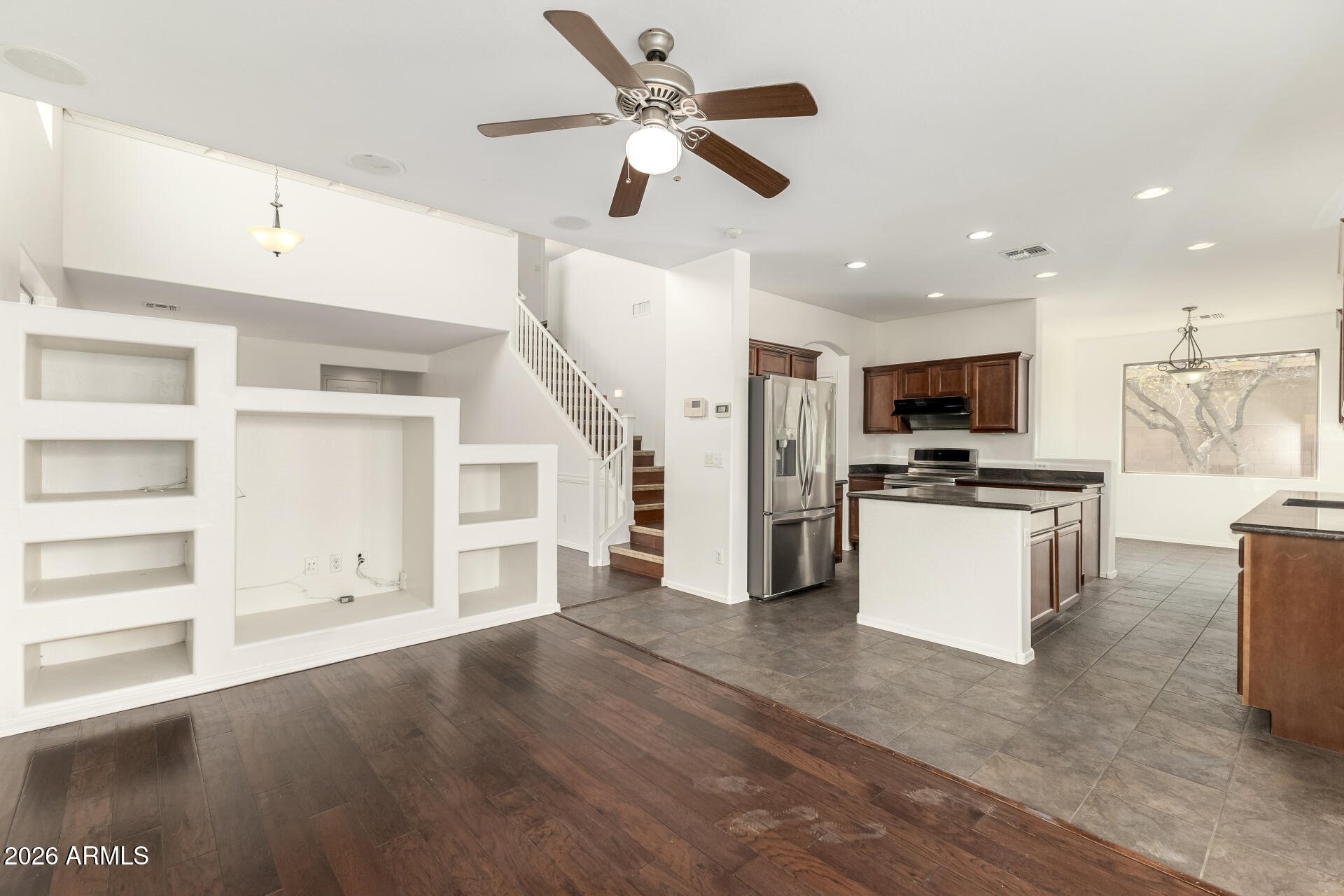 3628 East Janelle Way Gilbert, AZ 85298 - Photo 9 of 38 a view of kitchen with cabinets and wooden floor