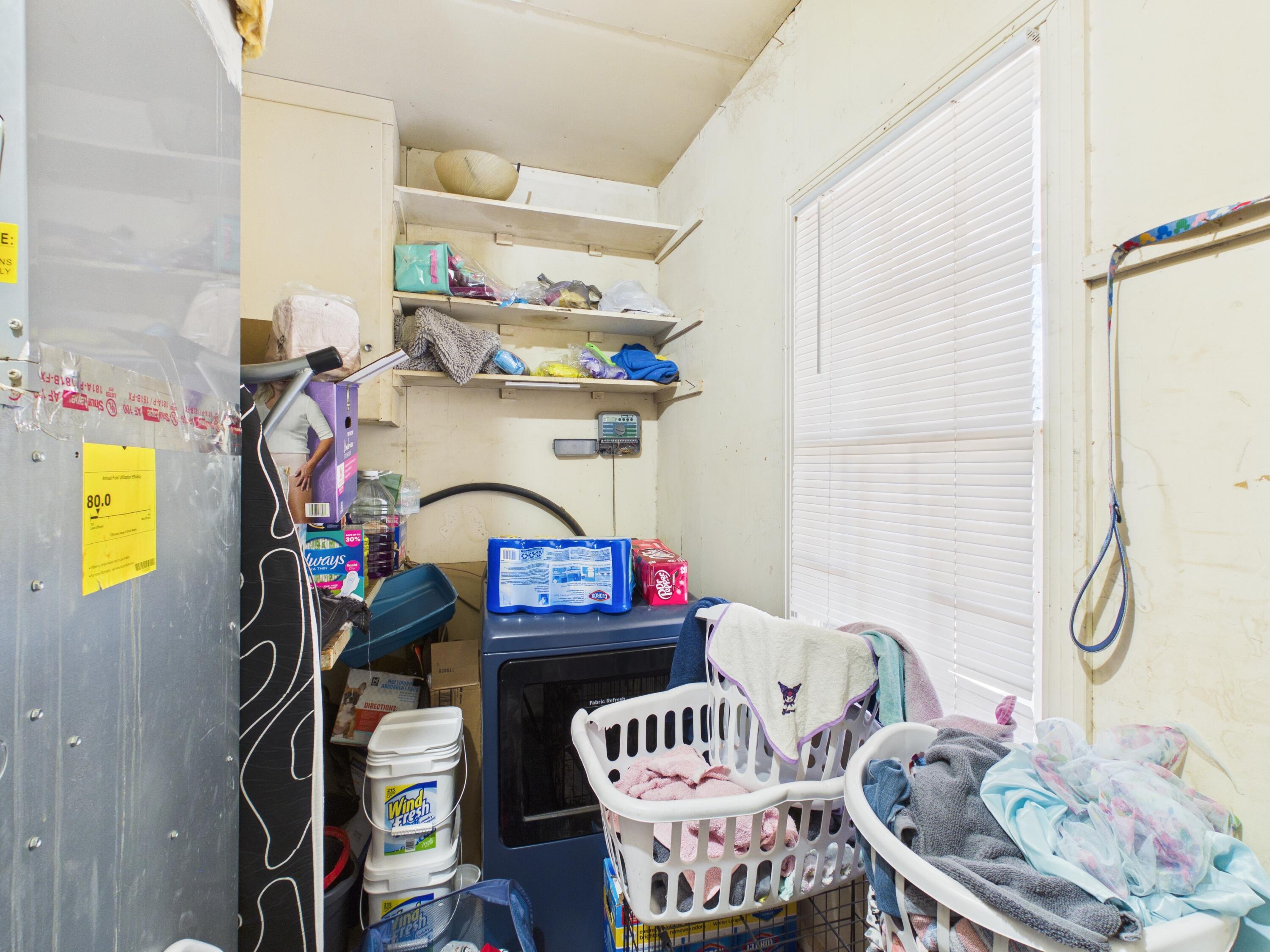 2016 41st Street Lubbock, TX 79412 - Photo 16 of 22 a living room with furniture and a window