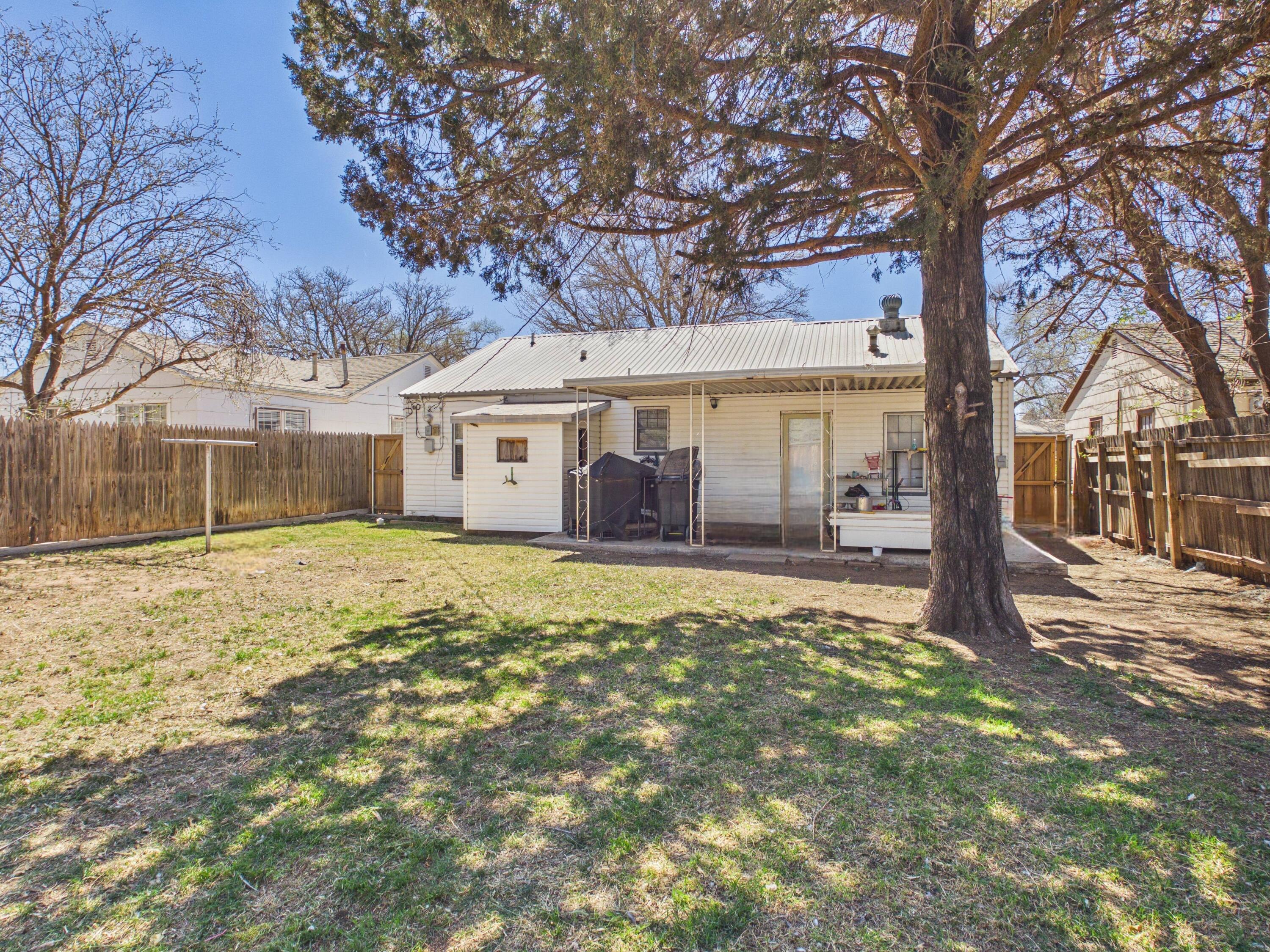 2016 41st Street Lubbock, TX 79412 - Photo 17 of 22 a house with trees in front of it