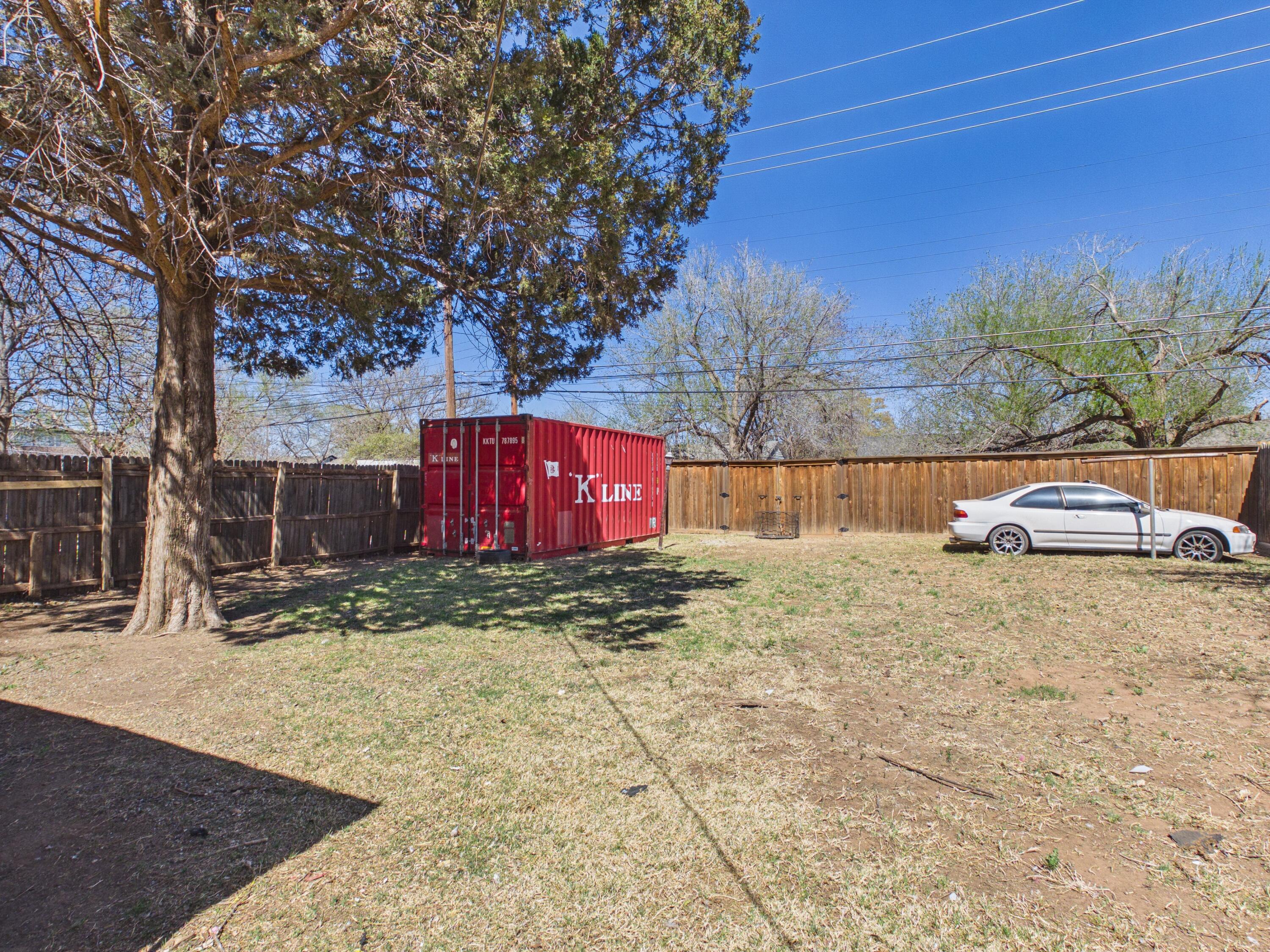 2016 41st Street Lubbock, TX 79412 - Photo 20 of 22 a view of backyard with large trees