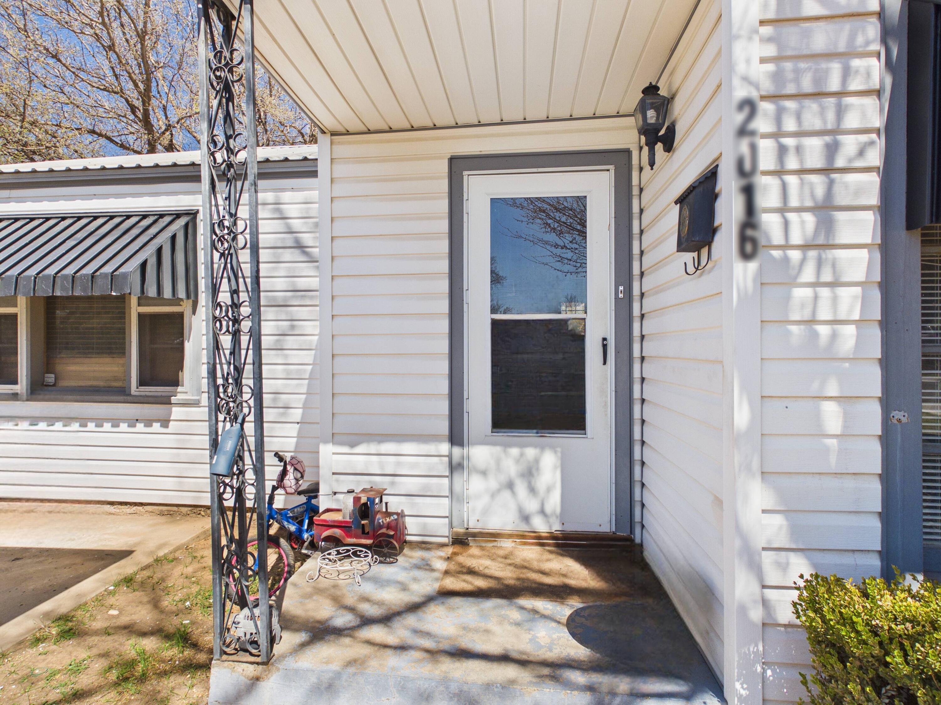2016 41st Street Lubbock, TX 79412 - Photo 3 of 22 a view of a entryway door of the house