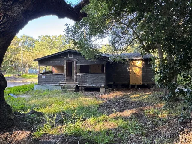 a fire hydrant in front of a house