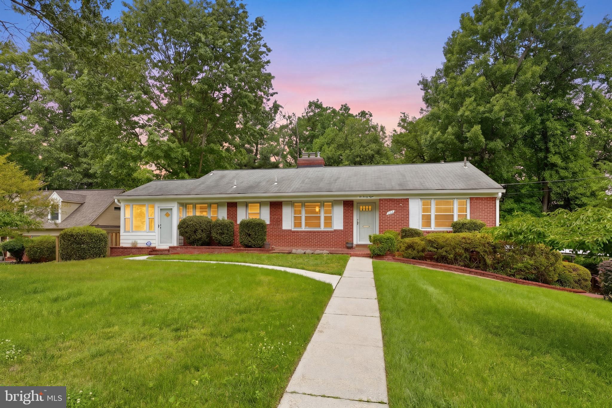 228 Northwest Terrace Silver Spring, MD 20901 - Photo 1 of 70 a front view of a house with a yard
