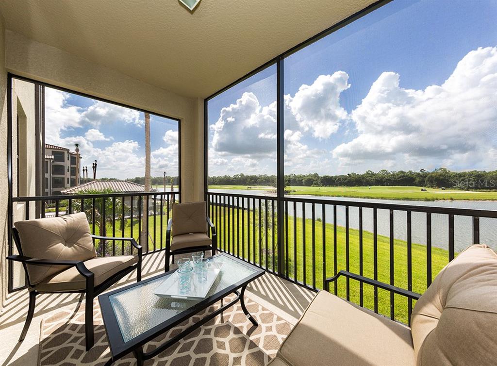 16904 Vardon Terrace, Unit 202 Lakewood Ranch, FL 34211 - Photo 5 of 30 a view of a city from a balcony