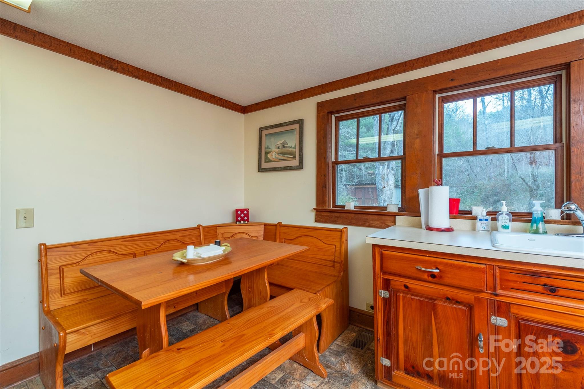 380 Buttercup Lane Marion, NC 28752 - Photo 35 of 48 a dining room with furniture and window