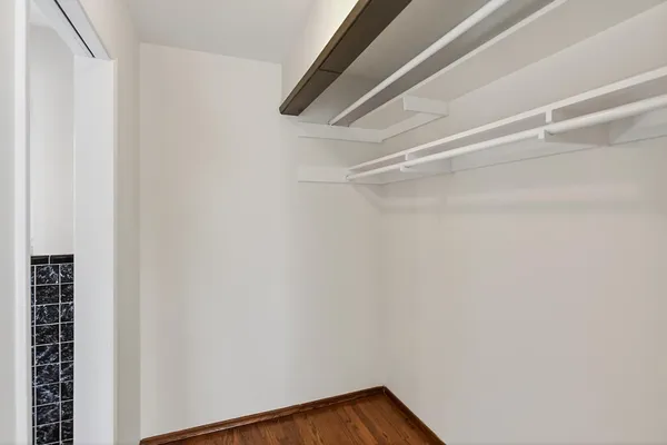 a view of a room with racks on the wall