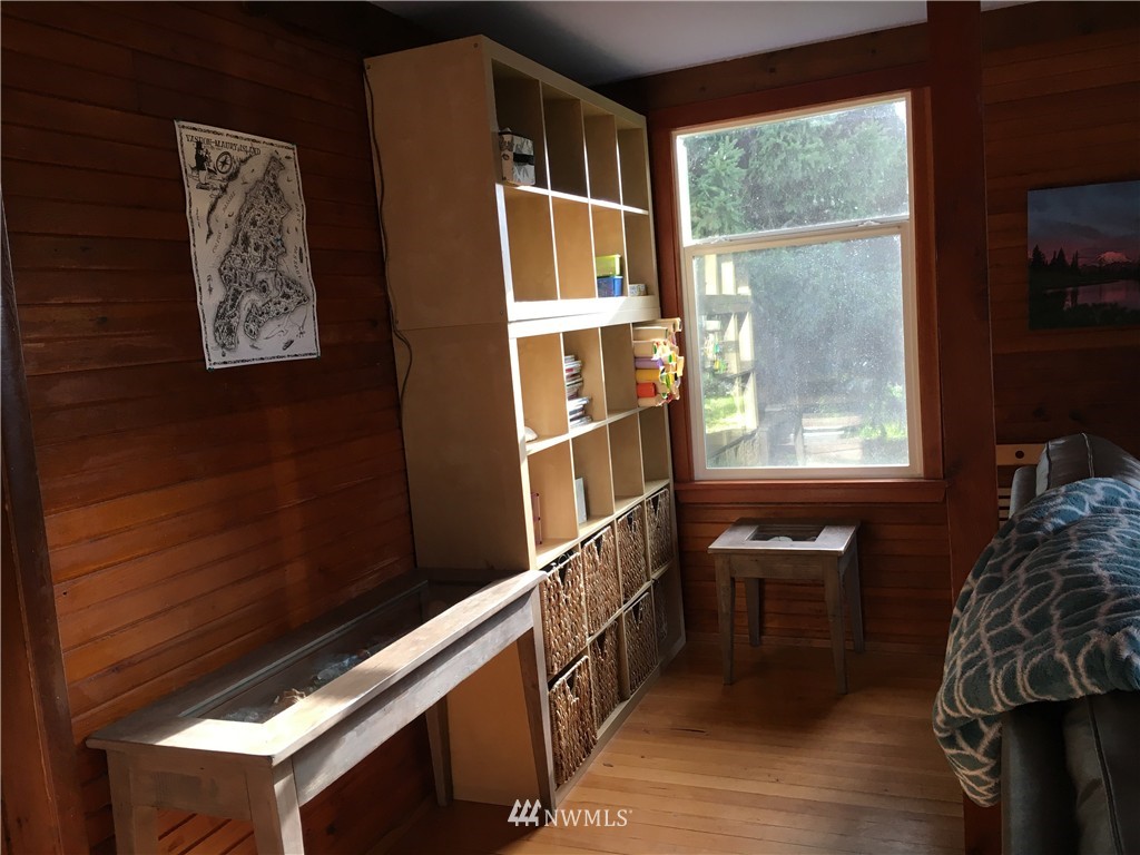 8725 Southwest Cemetery Road Vashon, WA 98070 - Photo 6 of 14 a view of entryway and hall with wooden floor