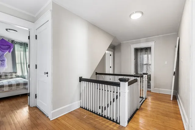a bathroom with a toilet a sink and a mirror