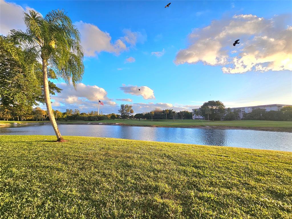 1460 Northwest 80th Avenue, Unit 101 Margate, FL 33063 - Photo 19 of 27 a view of a lake