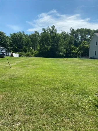 a view of a field with an outdoor space